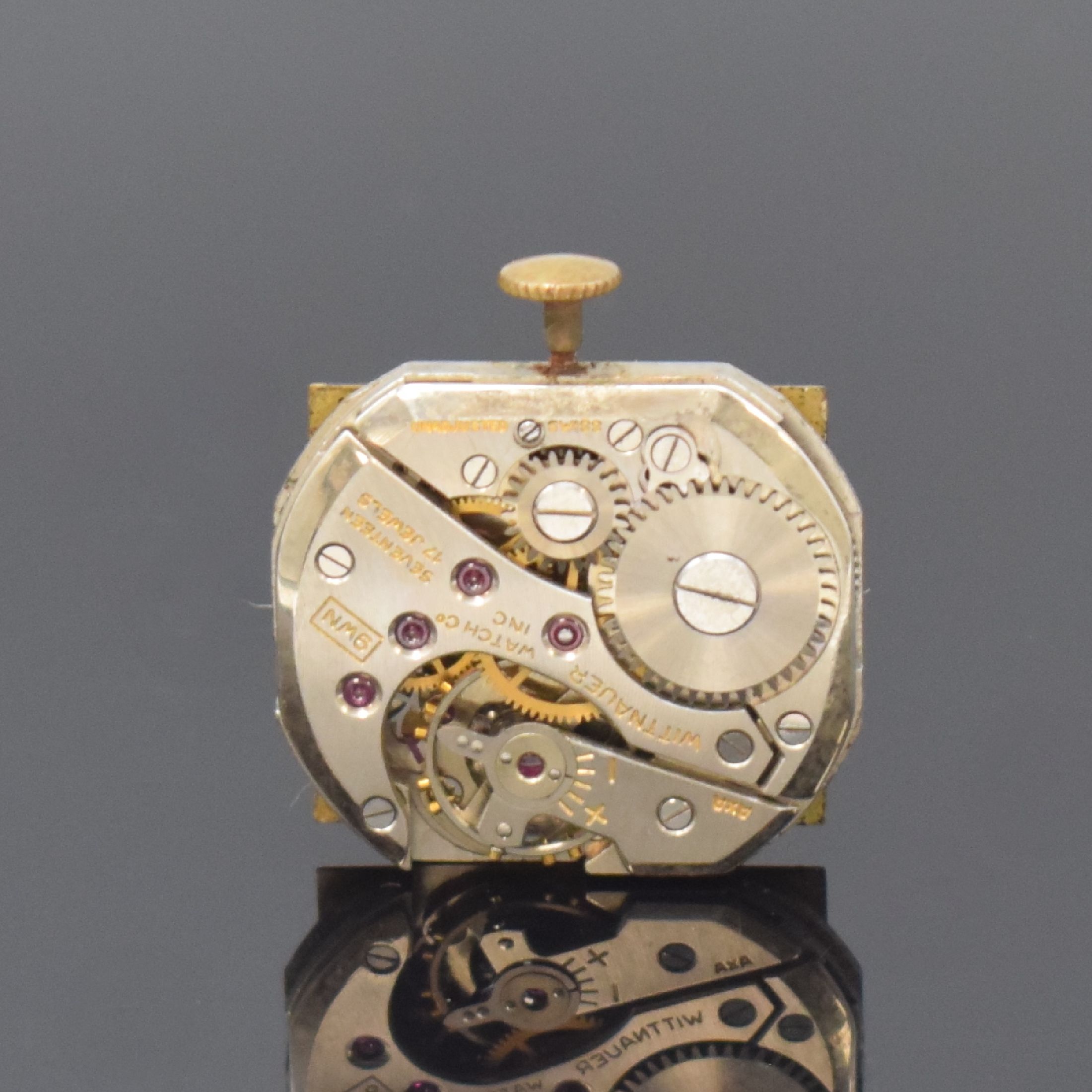 Detail c: WITTNAUER rechteckige Armbanduhr in GG 585/000, USA / Schweiz um 1955, Handaufzug, 2-tlg. Geh., Boden aufgedr., Lunette m. grav. Std.-Indizes, ...