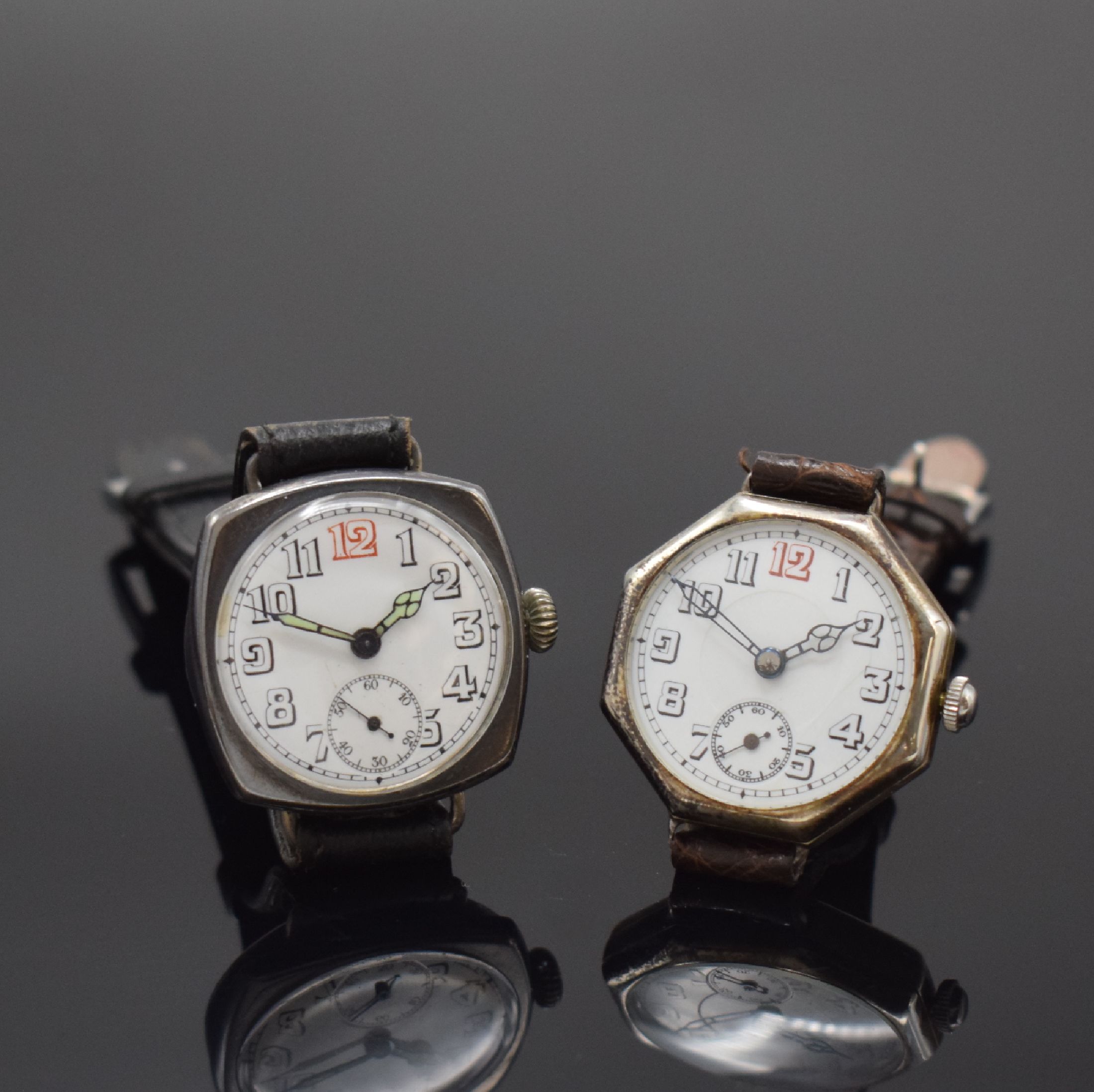 2 frühe Armbanduhren mit Emailzifferblättern in Silber / versilbert, Schweiz um 1915, Handaufzug, 3-tlg. Gehäuse, Böden u. Lünetten aufgedr., ...