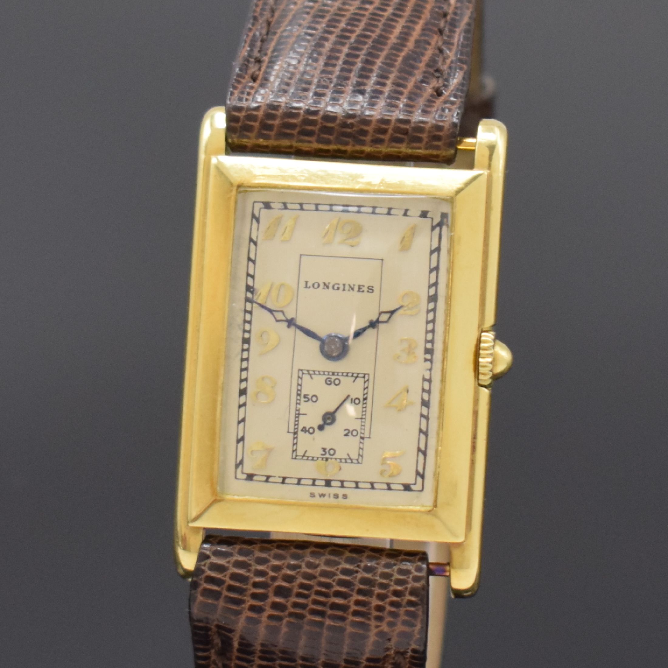 Detail a: LONGINES rechteckige Armbanduhr in GG 750/000, Schweiz um 1929, Handaufzug, Scharniergeh., silb. Zifferbl. rest. m. aufges. gold. Breguet-Zahlen, ...