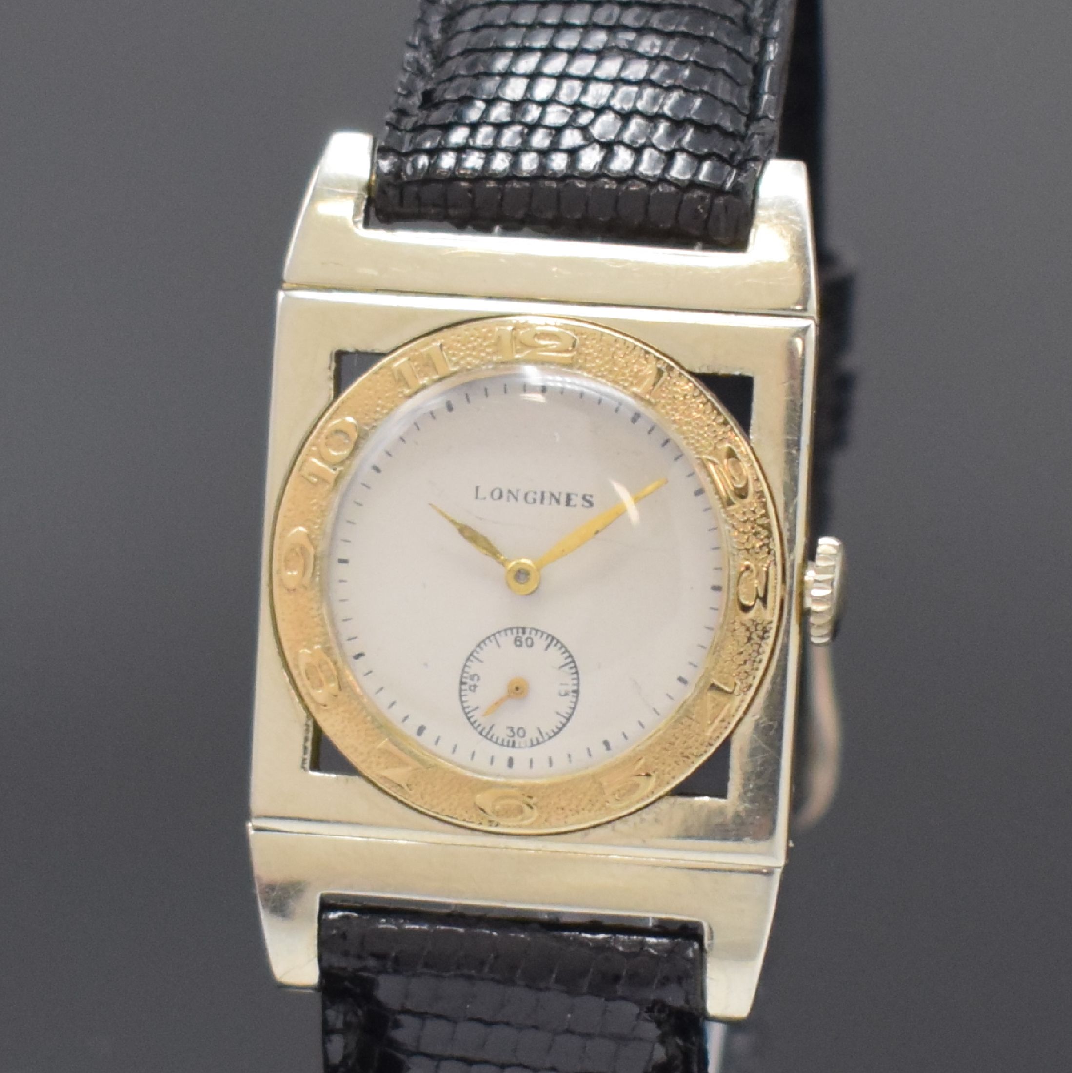 Detail a: LONGINES seltene rechteckige Armbanduhr in WG/GG 18k, USA / Schweiz um 1938, Handaufzug, 3-tlg. Geh. m. beweglichen Anstößen, GG-Lünette m. arab. ...