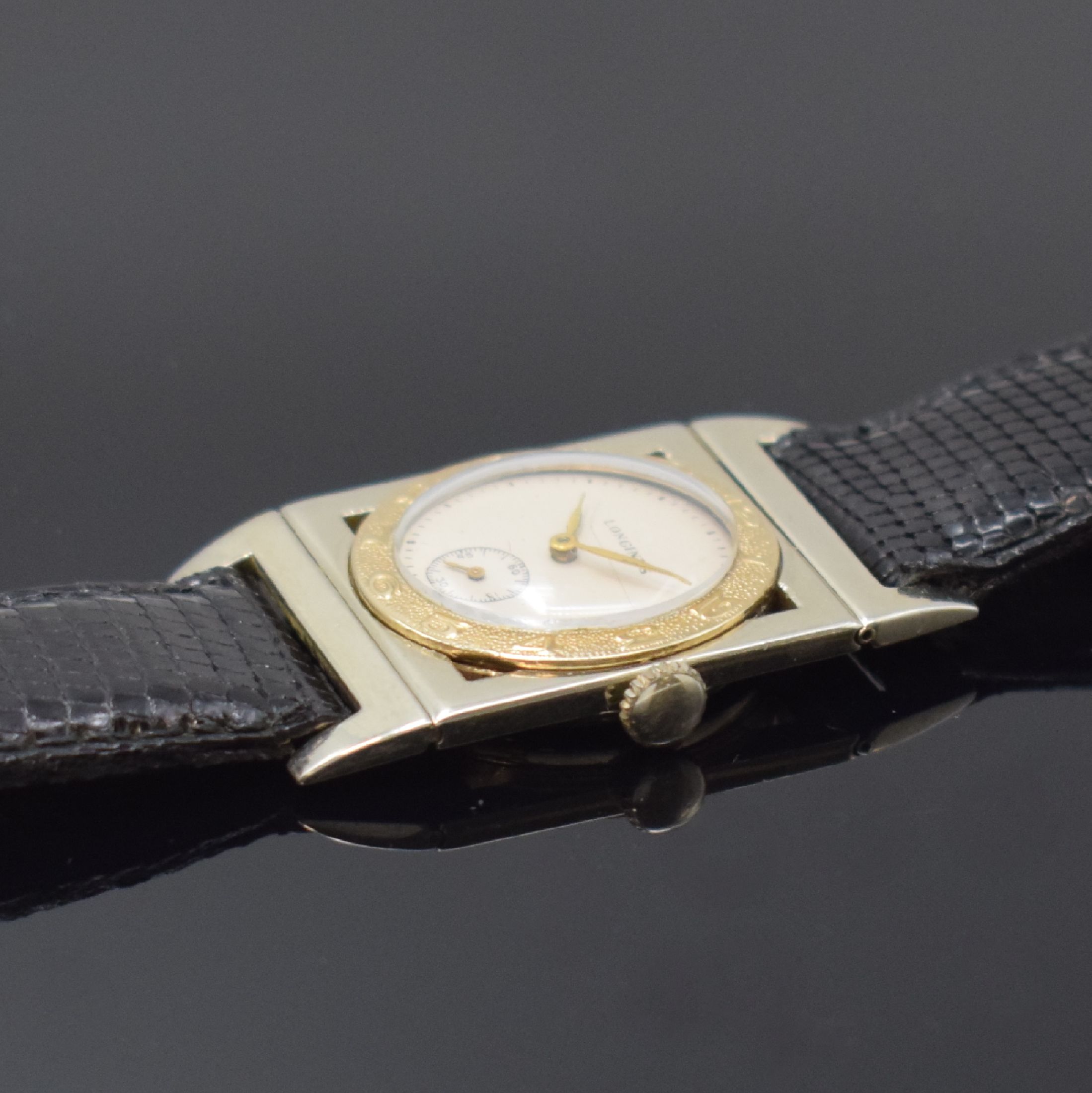 Detail b: LONGINES seltene rechteckige Armbanduhr in WG/GG 18k, USA / Schweiz um 1938, Handaufzug, 3-tlg. Geh. m. beweglichen Anstößen, GG-Lünette m. arab. ...