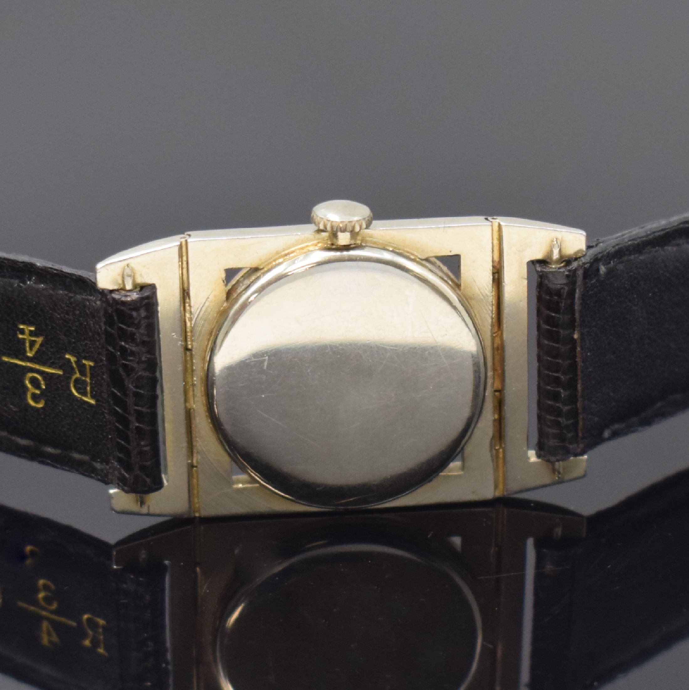 Detail c: LONGINES seltene rechteckige Armbanduhr in WG/GG 18k, USA / Schweiz um 1938, Handaufzug, 3-tlg. Geh. m. beweglichen Anstößen, GG-Lünette m. arab. ...