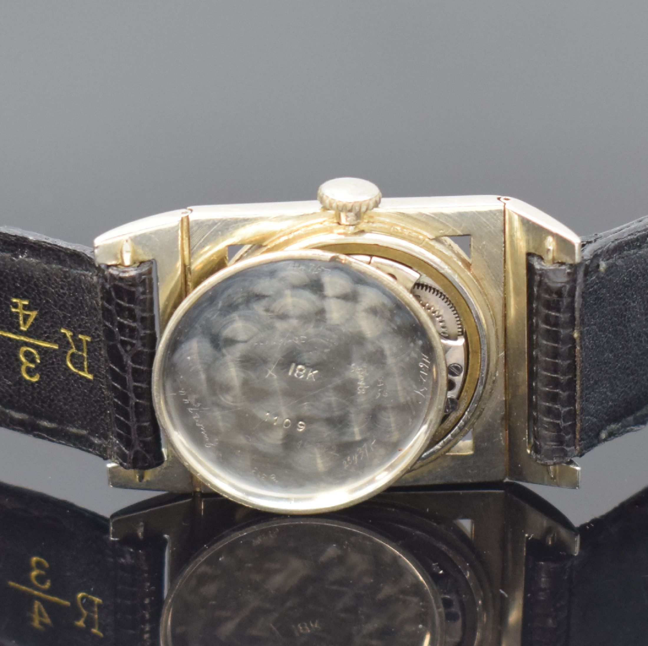 Detail e: LONGINES seltene rechteckige Armbanduhr in WG/GG 18k, USA / Schweiz um 1938, Handaufzug, 3-tlg. Geh. m. beweglichen Anstößen, GG-Lünette m. arab. ...