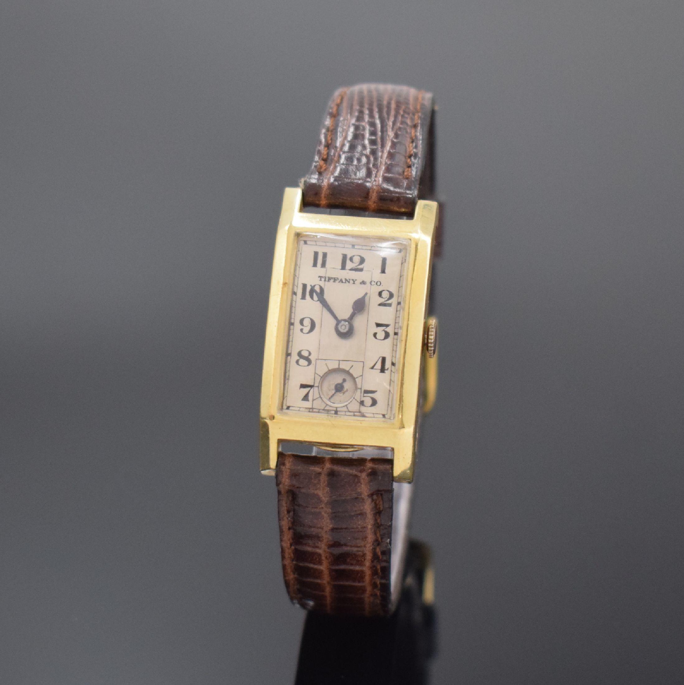 MARVIN rechteckige Armbanduhr in GG 585/000, Schweiz / USA um 1940, Handaufzug, 2-tlg. Geh., Boden aufgedr., silb. Duoton-Zifferbl. rest., gebl. ...