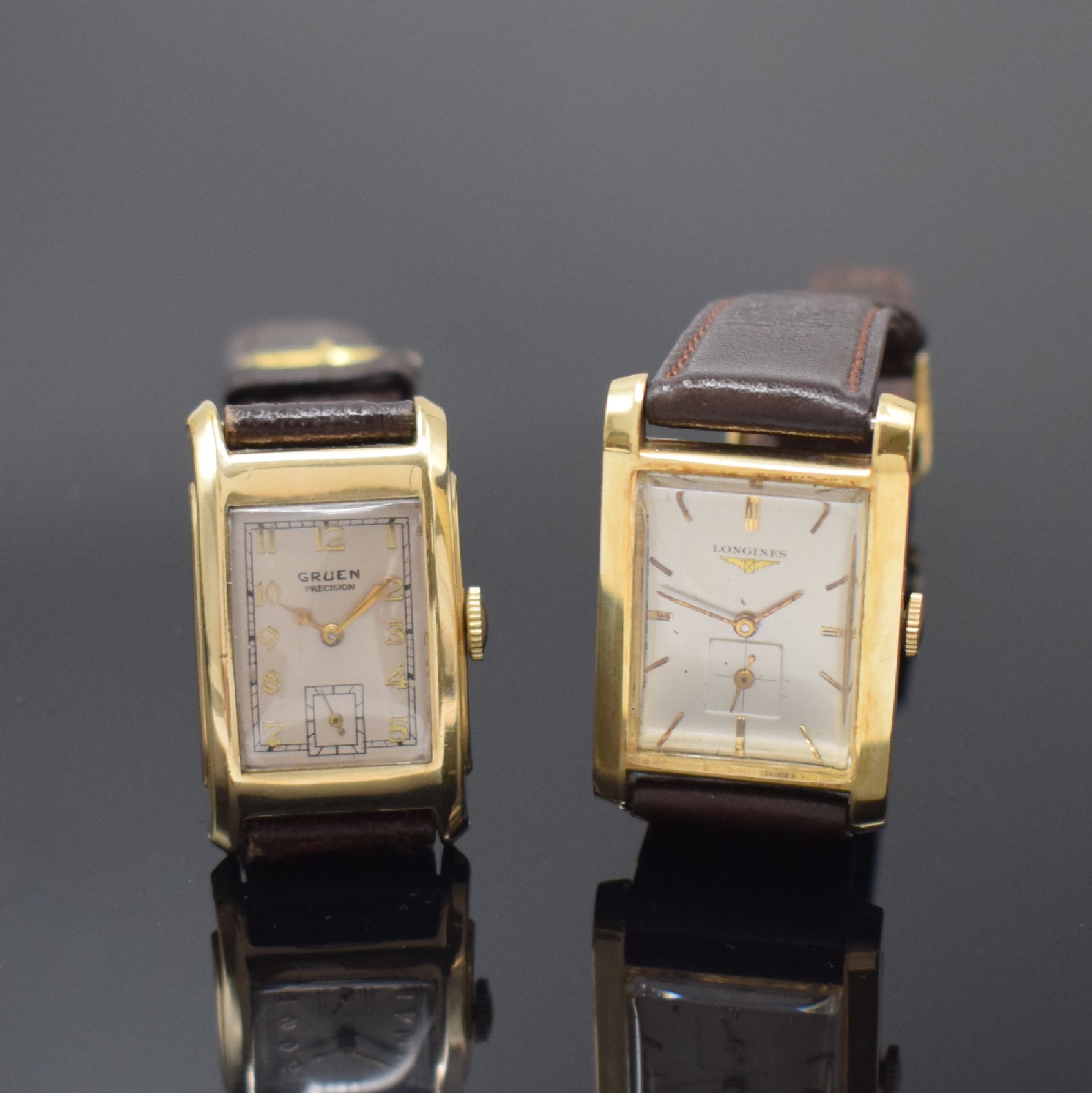 LONGINES / GRUEN 2 rechteckige goldfilled Armbanduhren, Schweiz / USA um 1955 / 1945, Handaufzug, 2-tlg. Geh., Böden (Monogramm- Grav.) aufgedr., ...