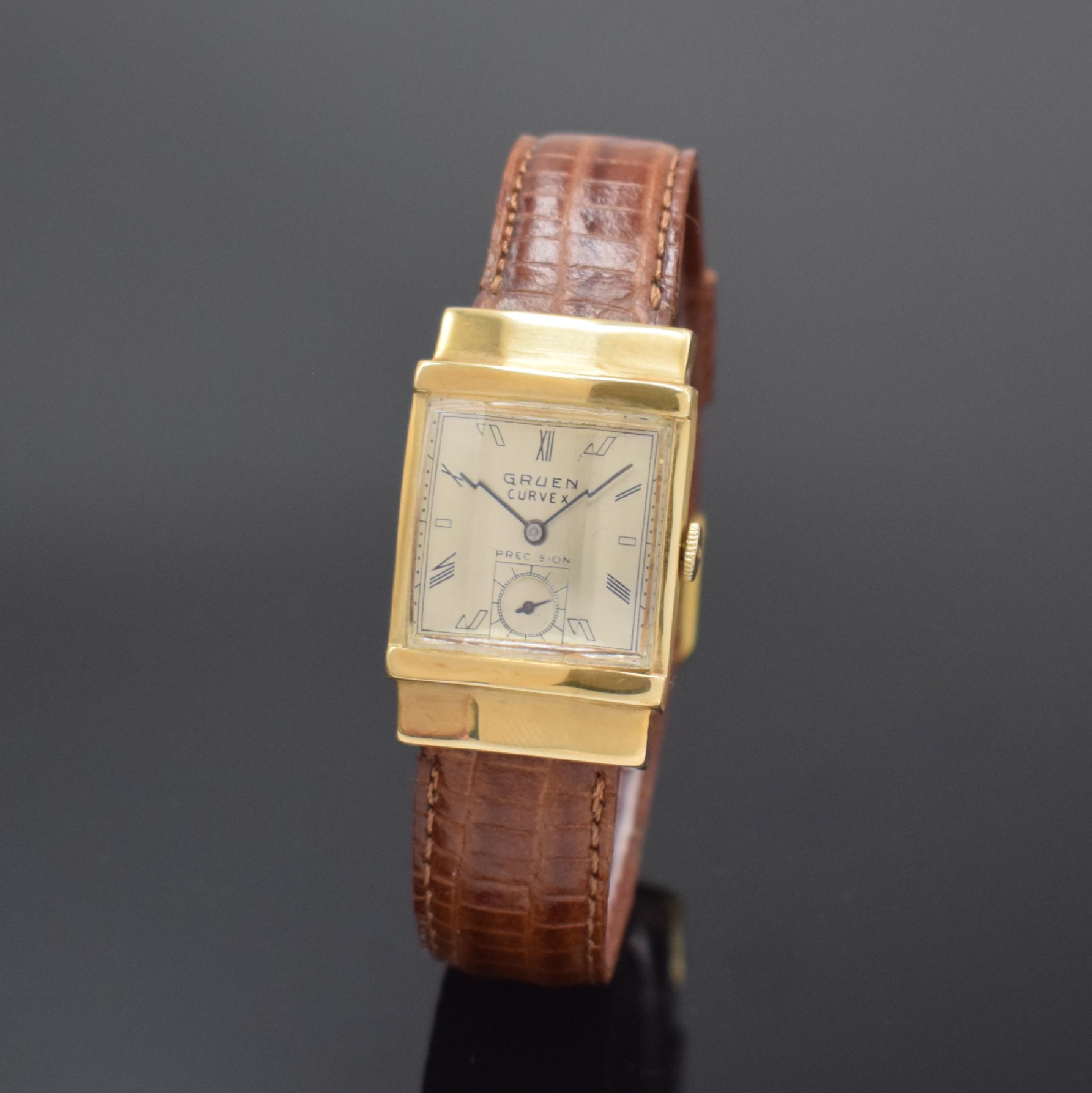 GRUEN Curvex rechteckige Armbanduhr Ref. 440- 584 in GG 585/000, Schweiz / USA um 1940, Handaufzug, 2-tlg. Geh., facettierte, verdeckte Anstöße, ...