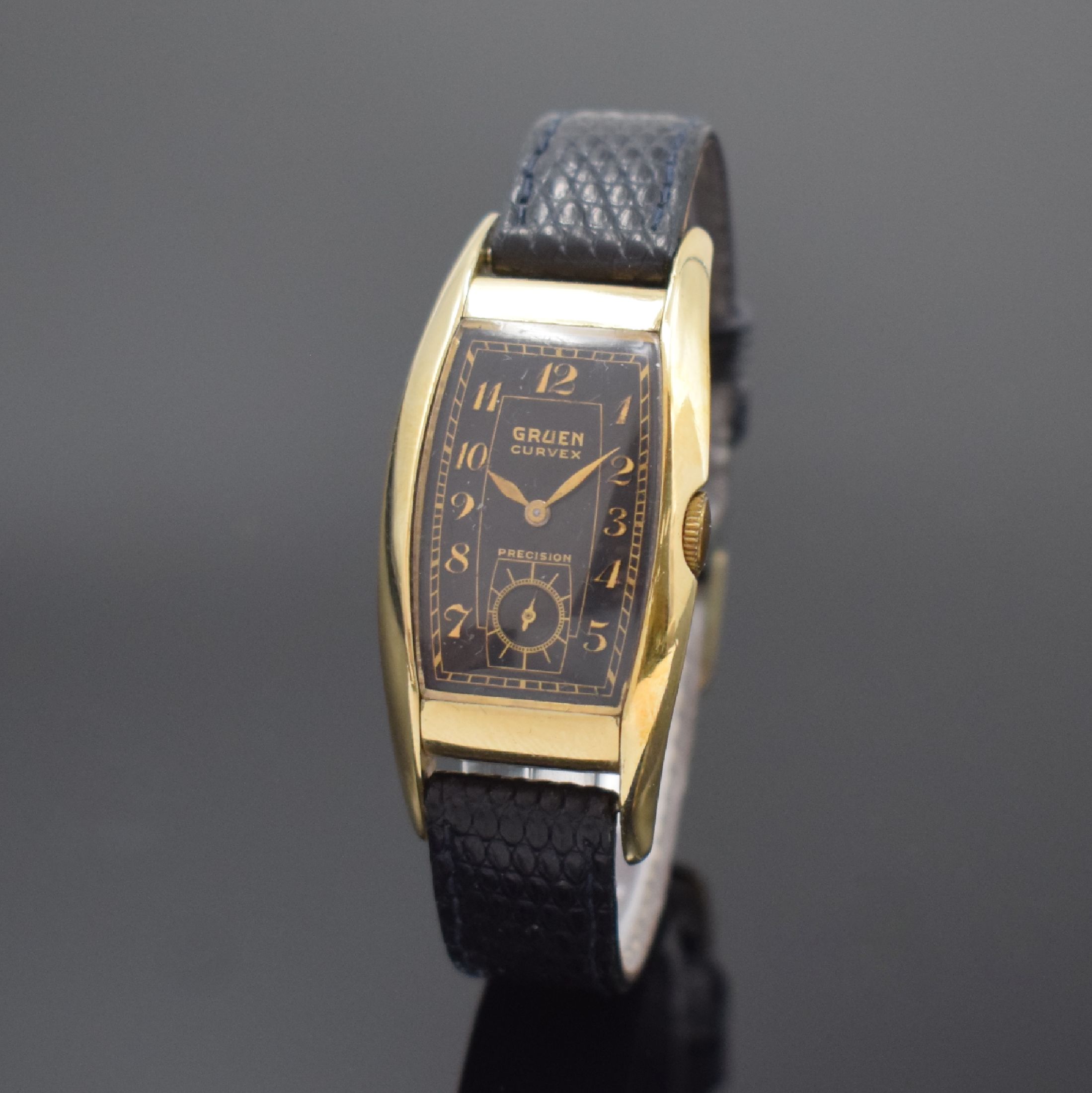 GRUEN Curvex Precision rechteckige Armbanduhr Referenz 311 271 in 14k-goldfilled, Schweiz / USA um 1945, Handaufzug, stark gebogenes 2- tlg. Geh., ...
