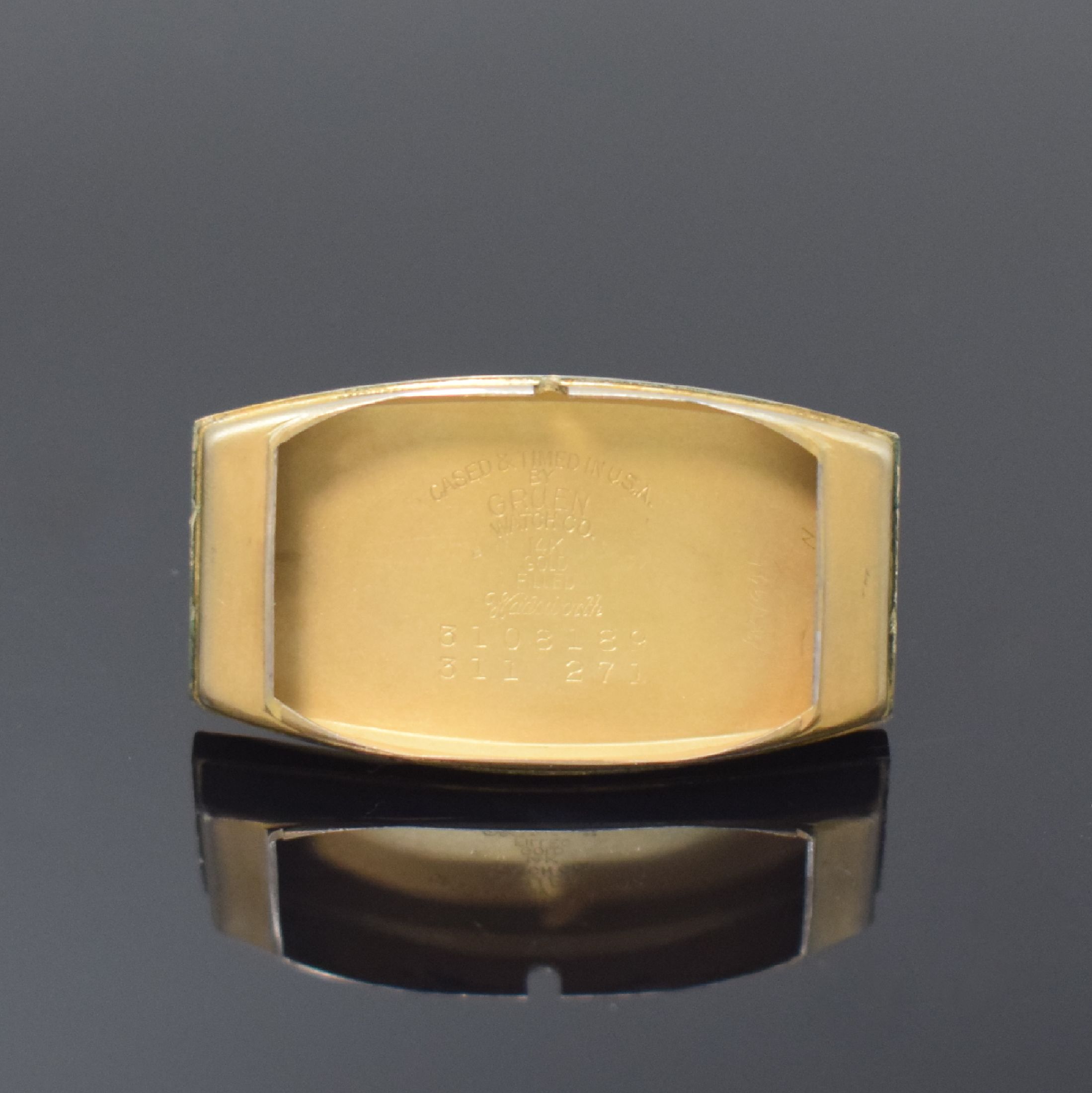 Detail e: GRUEN Curvex Precision rechteckige Armbanduhr Referenz 311 271 in 14k-goldfilled, Schweiz / USA um 1945, Handaufzug, stark gebogenes 2- tlg. Geh., ...
