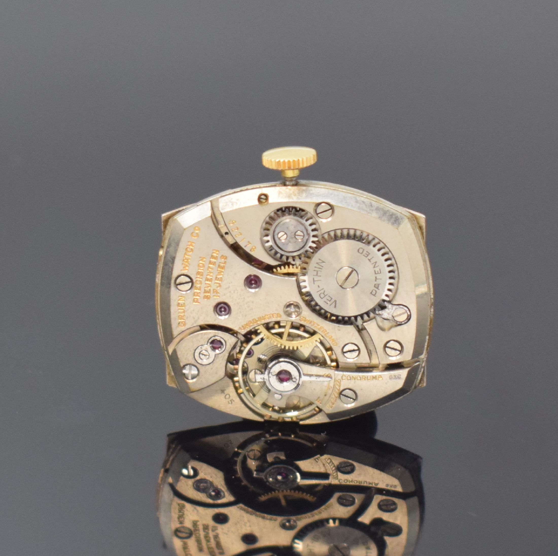 Detail f: GRUEN 3 10k-goldfilled Armbanduhren, Schweiz / USA um 1945, Handaufzug, 2-tlg. tonneau- förm. Geh., Böden in Stahl / goldfilled aufgedr., silb. ...