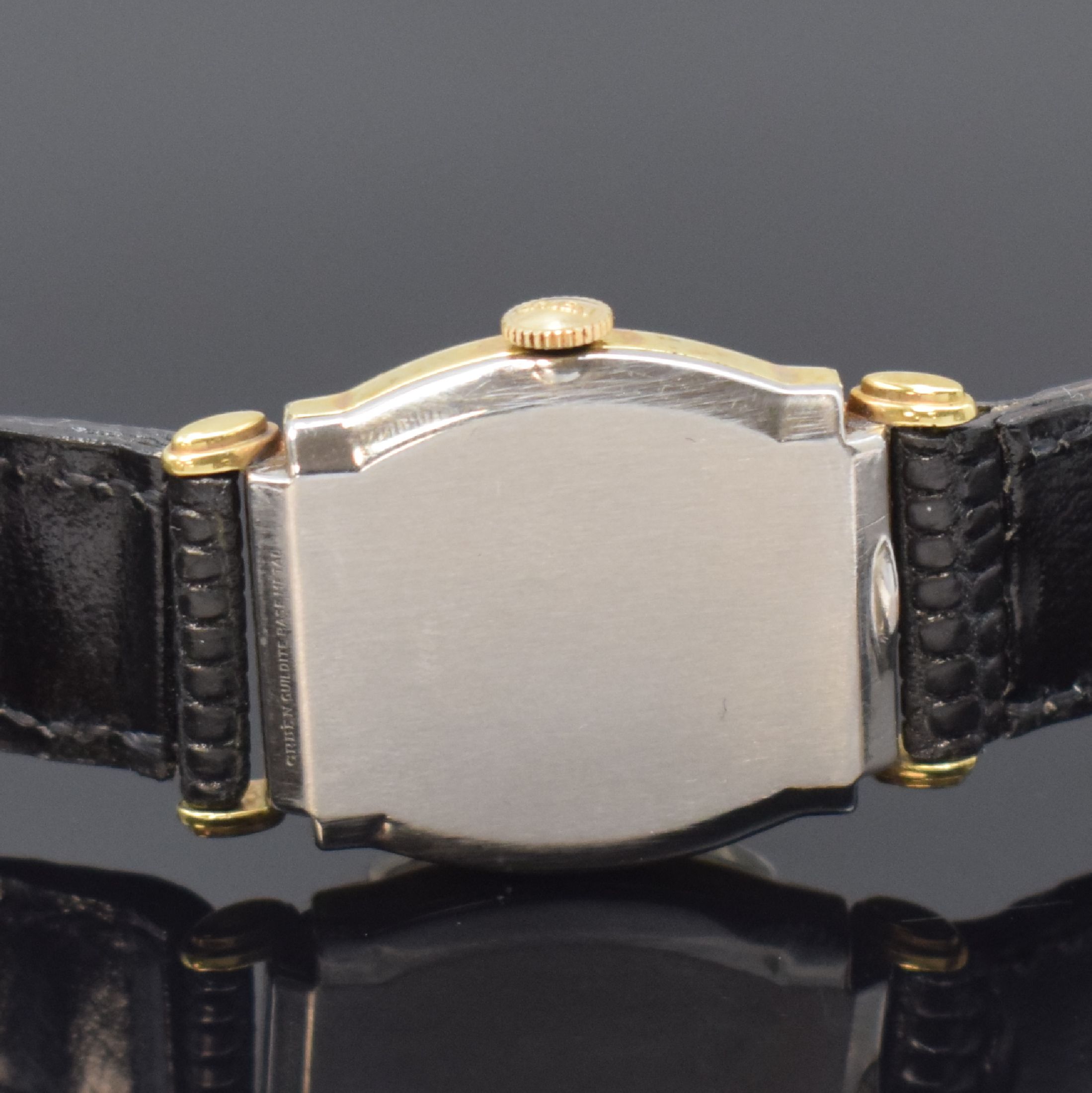 Detail h: GRUEN 3 10k-goldfilled Armbanduhren, Schweiz / USA um 1945, Handaufzug, 2-tlg. tonneau- förm. Geh., Böden in Stahl / goldfilled aufgedr., silb. ...