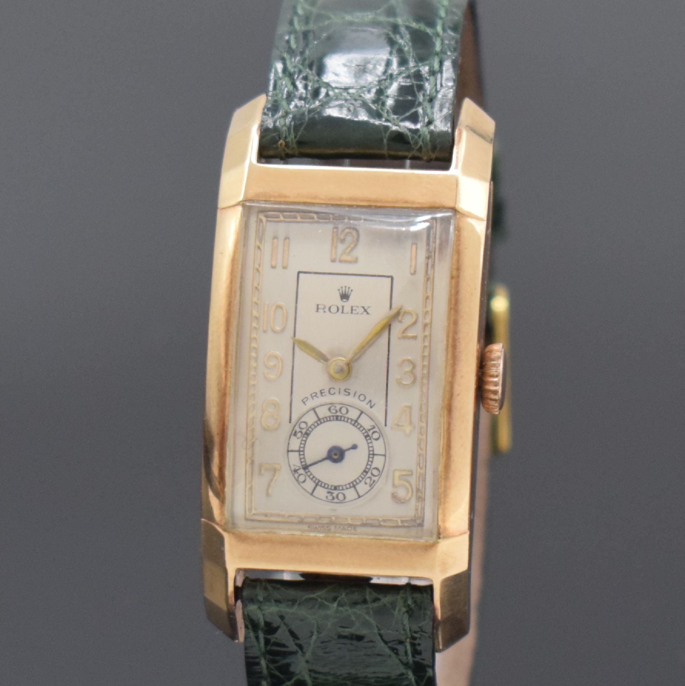 Detail a: ROLEX rechteckige Armbanduhr Referenz 3059 in RG 9k, Handaufzug, stark gebogenes 2-tlg. Geh., Boden aufgedr., silb. Zifferbl. rest., vers. Formwerk, ...