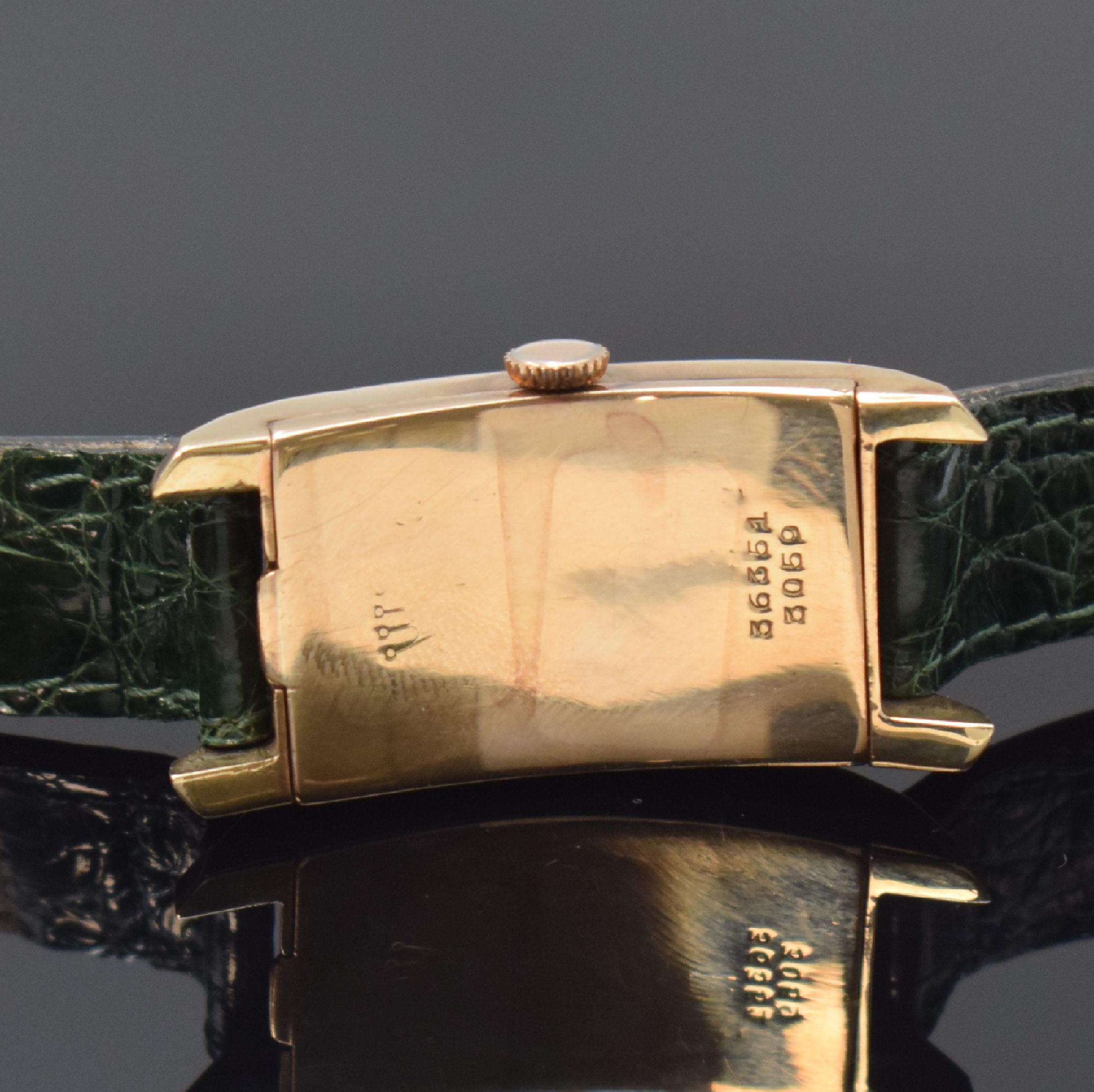 Detail c: ROLEX rechteckige Armbanduhr Referenz 3059 in RG 9k, Handaufzug, stark gebogenes 2-tlg. Geh., Boden aufgedr., silb. Zifferbl. rest., vers. Formwerk, ...