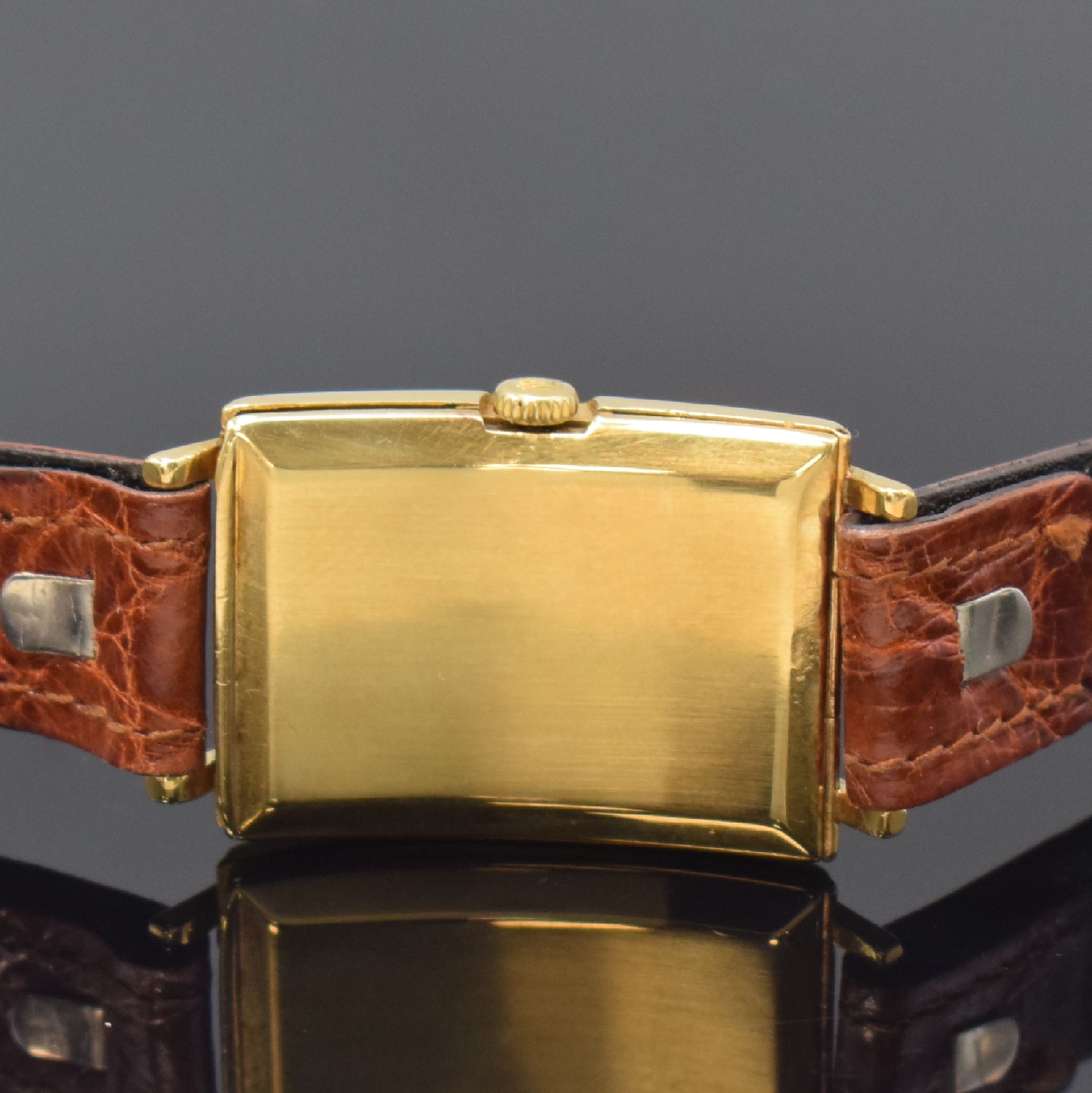 Detail c: ROLEX rechteckige Armbanduhr in 9k Gelbgold, Schweiz für England um 1930, Handaufzug, gebogenes Scharniergeh., London Import-Stempel v. 1929, silb. ...