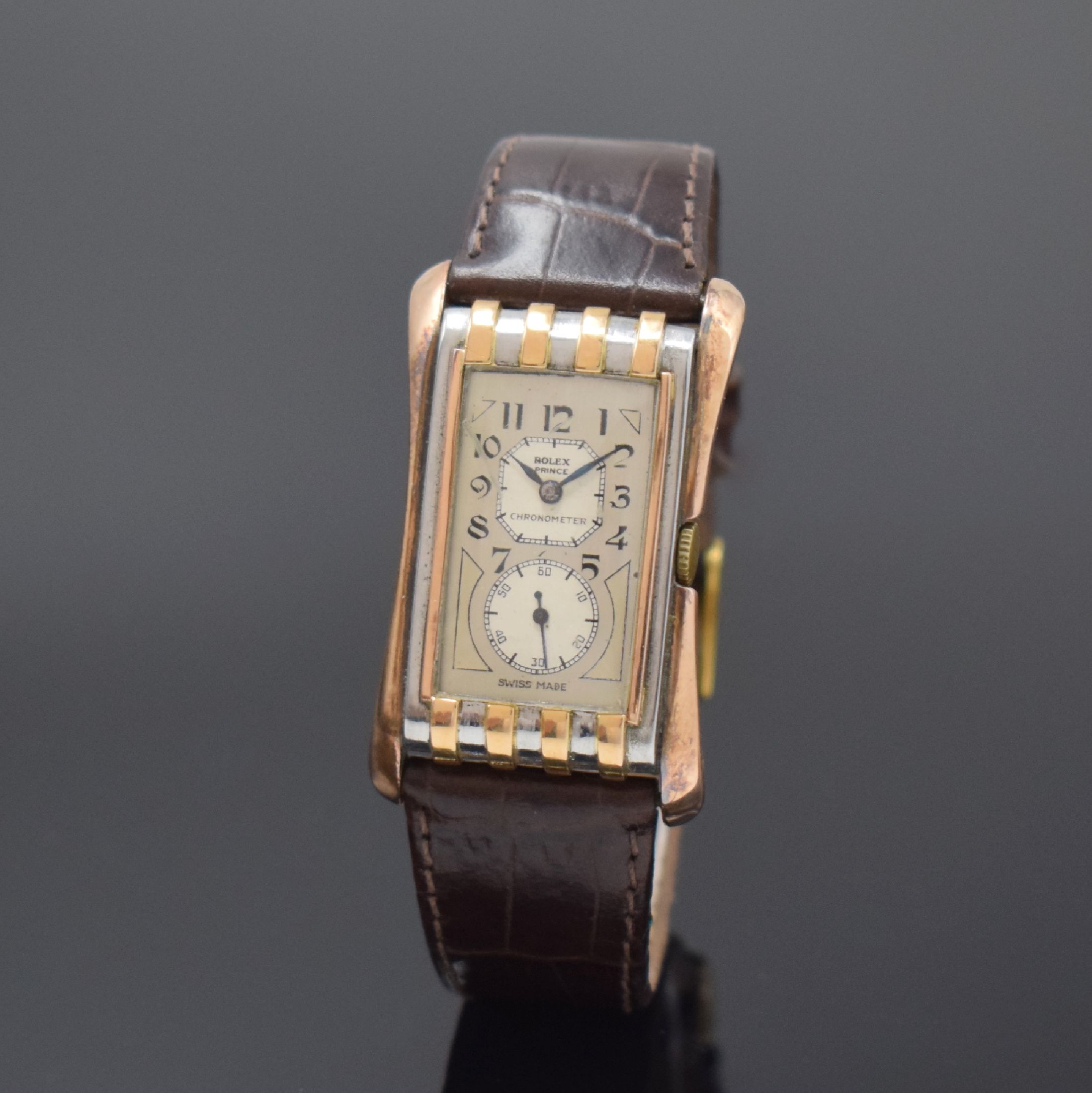 ROLEX Prince Referenz 1490 rechteckige Armbanduhr in Stahl/Rotgold, Schweiz um 1935, Handaufzug, 2-tlg. Geh. m. geschweiften Rotgold-Seiten, aufges. ...