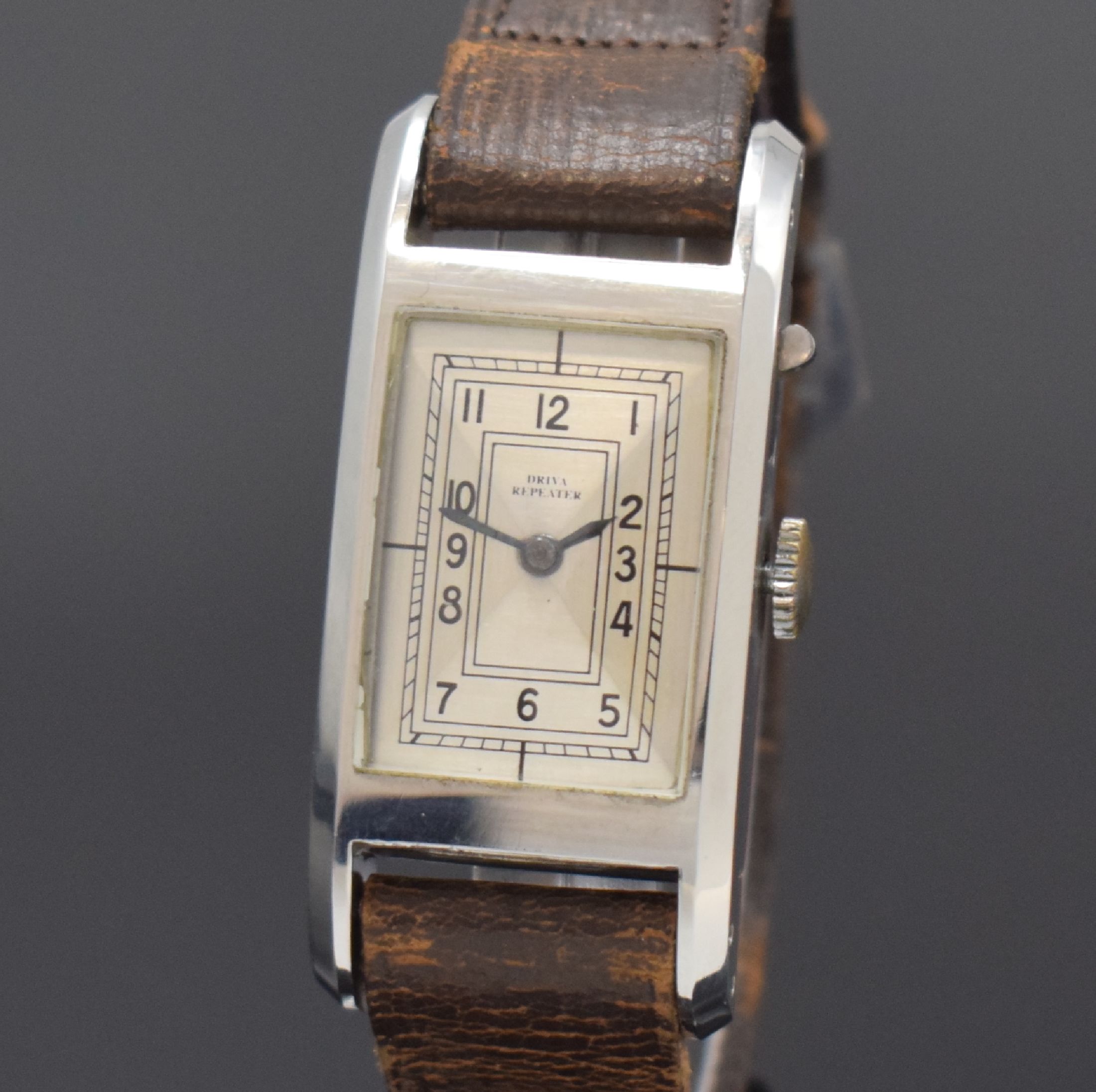 Detail a: DRIVA Repeater sehr seltene rechteckige Armbanduhr mit 1/4-Repetition in Stahl, Schweiz um 1935, Handaufzug, 2-tlg. Geh., Boden aufgedr., seitl. ...