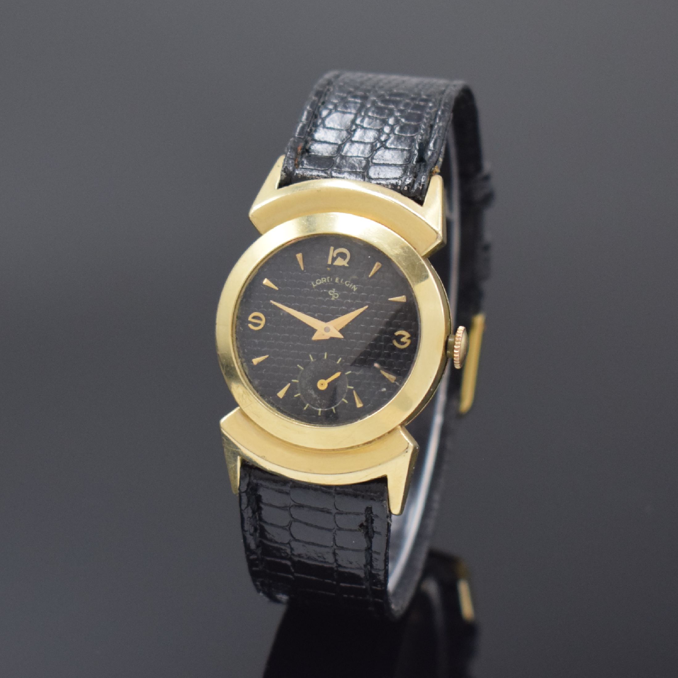 LORD ELGIN Armbanduhr in 14k gold filled, USA um 1945, Handaufzug, 2-tlg. Geh., Boden aufgedr., ausgefallene Bandanstöße, schwarzes ...