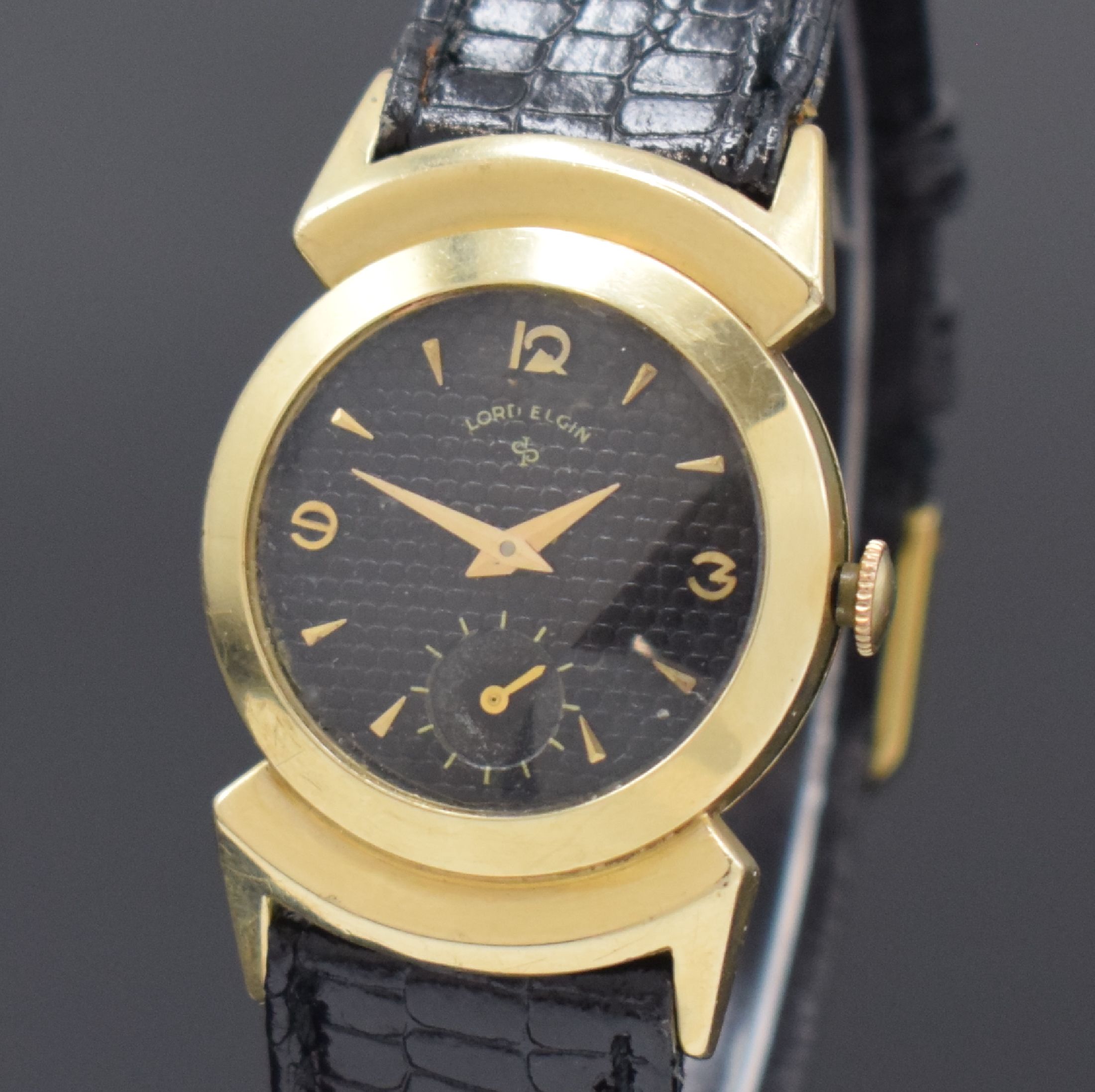 Detail a: LORD ELGIN Armbanduhr in 14k gold filled, USA um 1945, Handaufzug, 2-tlg. Geh., Boden aufgedr., ausgefallene Bandanstöße, schwarzes ...