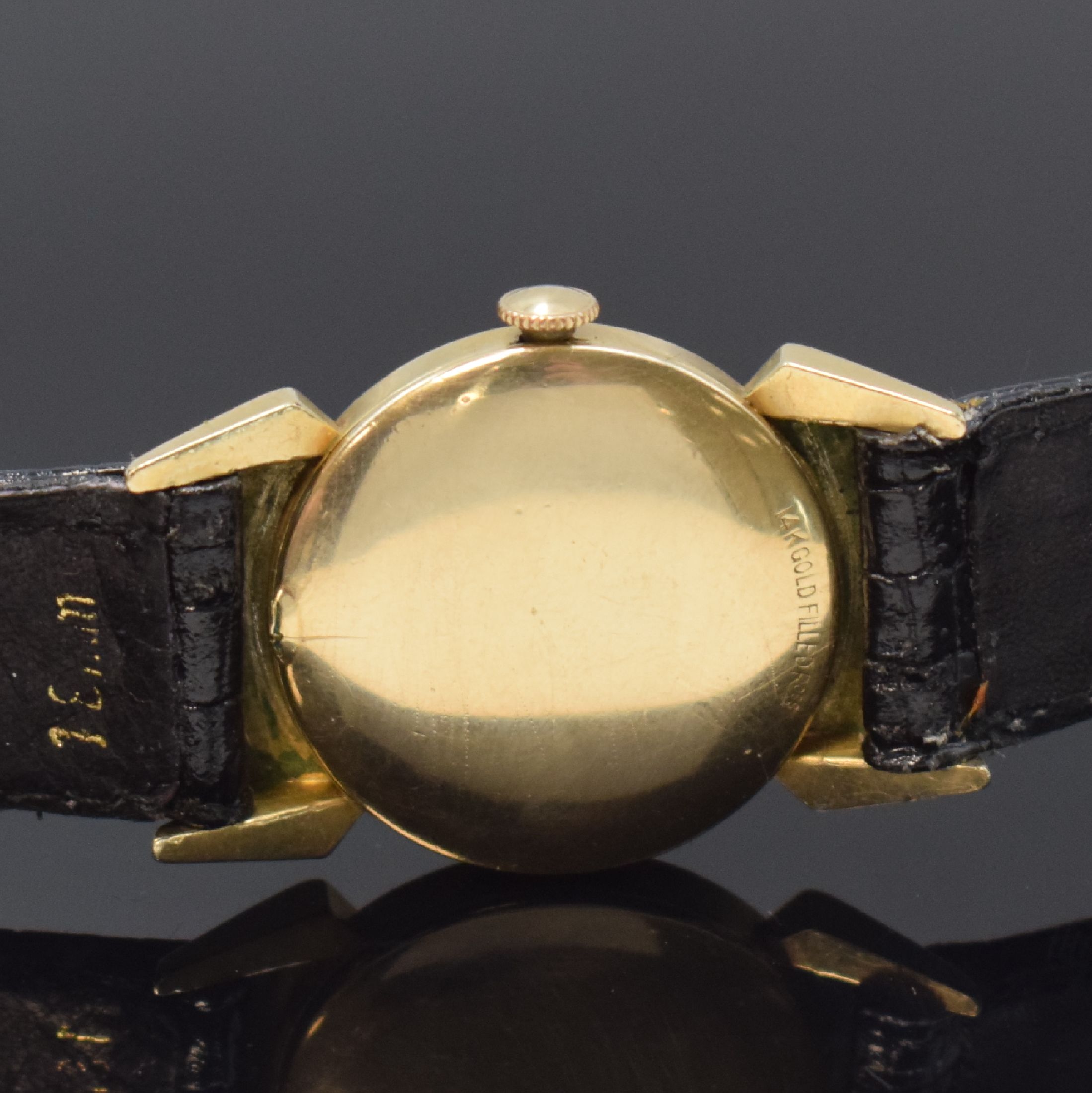 Detail d: LORD ELGIN Armbanduhr in 14k gold filled, USA um 1945, Handaufzug, 2-tlg. Geh., Boden aufgedr., ausgefallene Bandanstöße, schwarzes ...
