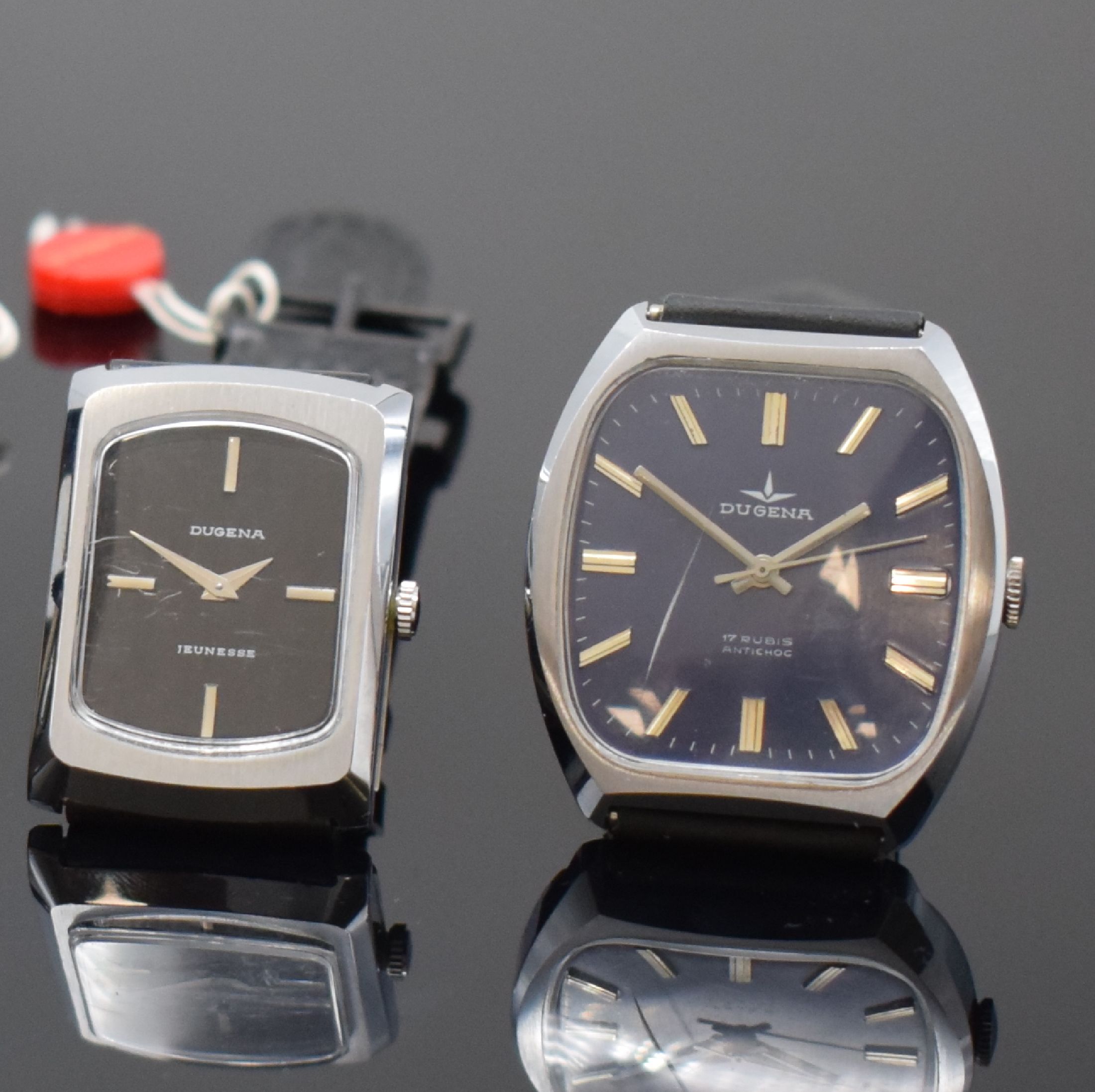Detail a: DUGENA 5 Armbanduhren aus Lagerbestand, Schweiz um 1970, Handaufzug, 4 verchromte u. 1 Stahlgeh. m. aufgedr. Stahlboden, Gläser teilw. besch., ...