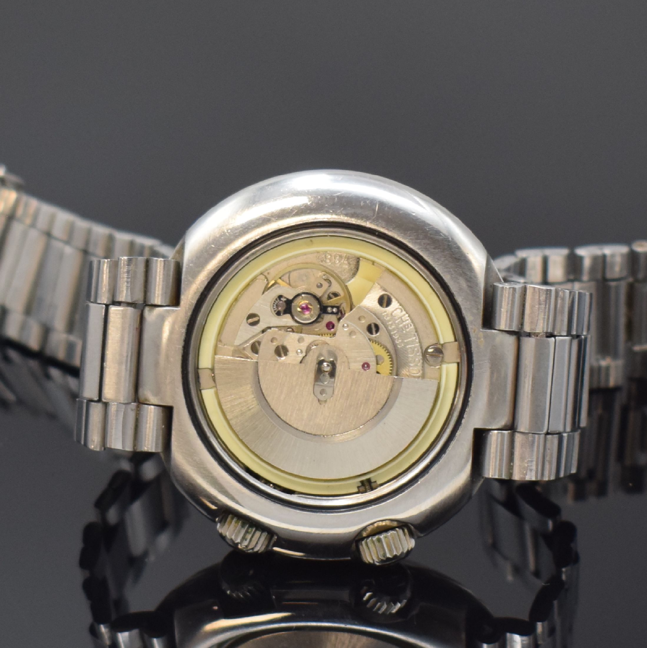 Detail e: TISSOT Navigator T12 Herrenarmbanduhr mit Weltzeitanzeige Referenz 44596, Schweiz um 1970, Automatik, massives Edelstahlgeh. inkl. neutr. Gliederband ...