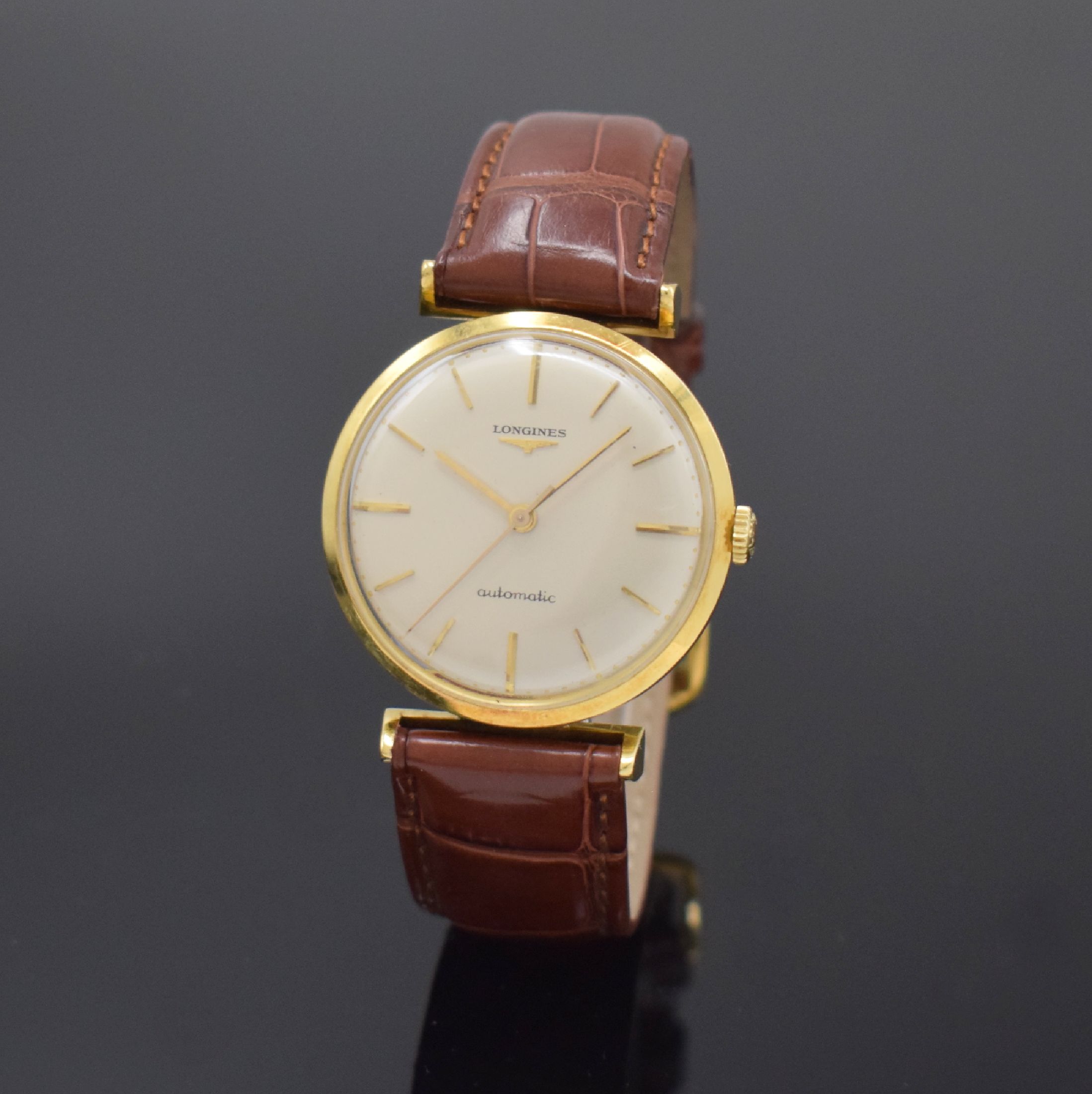 LONGINES Herrenarmbanduhr in GG 750/000 Referenz 7003 1, Schweiz um 1960, Automatik, Boden u. Glasrand aufgedr., vers. Zifferbl. m. aufges. Indizes, ...