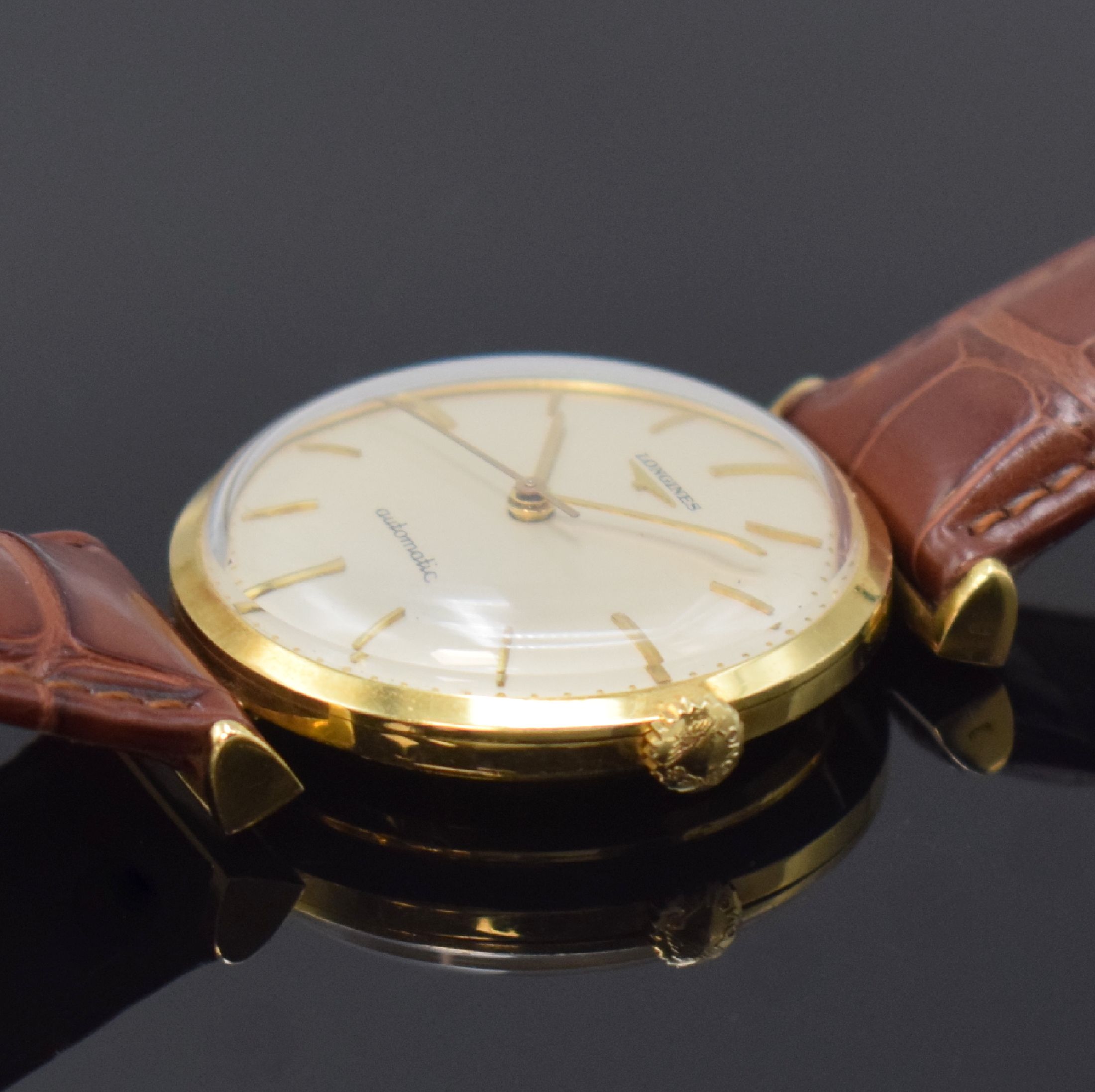 Detail b: LONGINES Herrenarmbanduhr in GG 750/000 Referenz 7003 1, Schweiz um 1960, Automatik, Boden u. Glasrand aufgedr., vers. Zifferbl. m. aufges. Indizes, ...