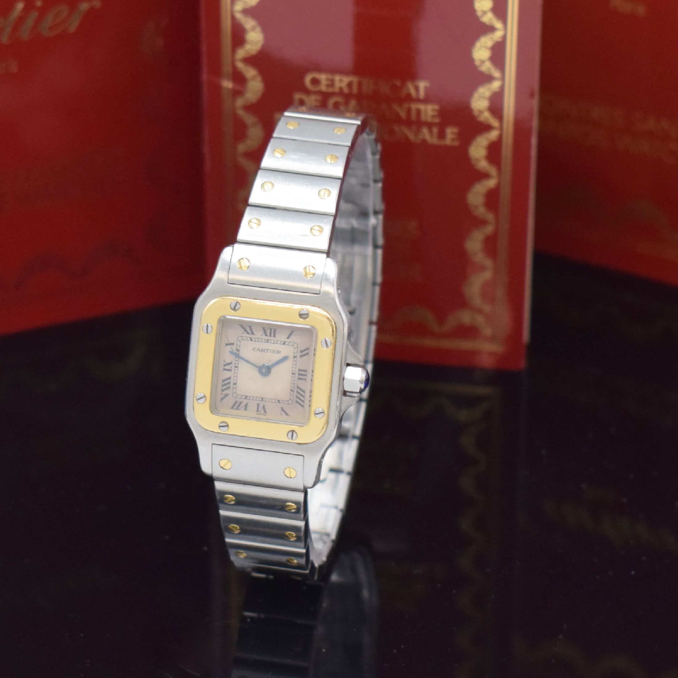 CARTIER Santos Damenarmbanduhr in Stahl/Gold Referenz 1057930, Schweiz verk. lt. beil. Pap. 08/1993, quartz, Boden 8-fach verschr., orig. Gliederband ...