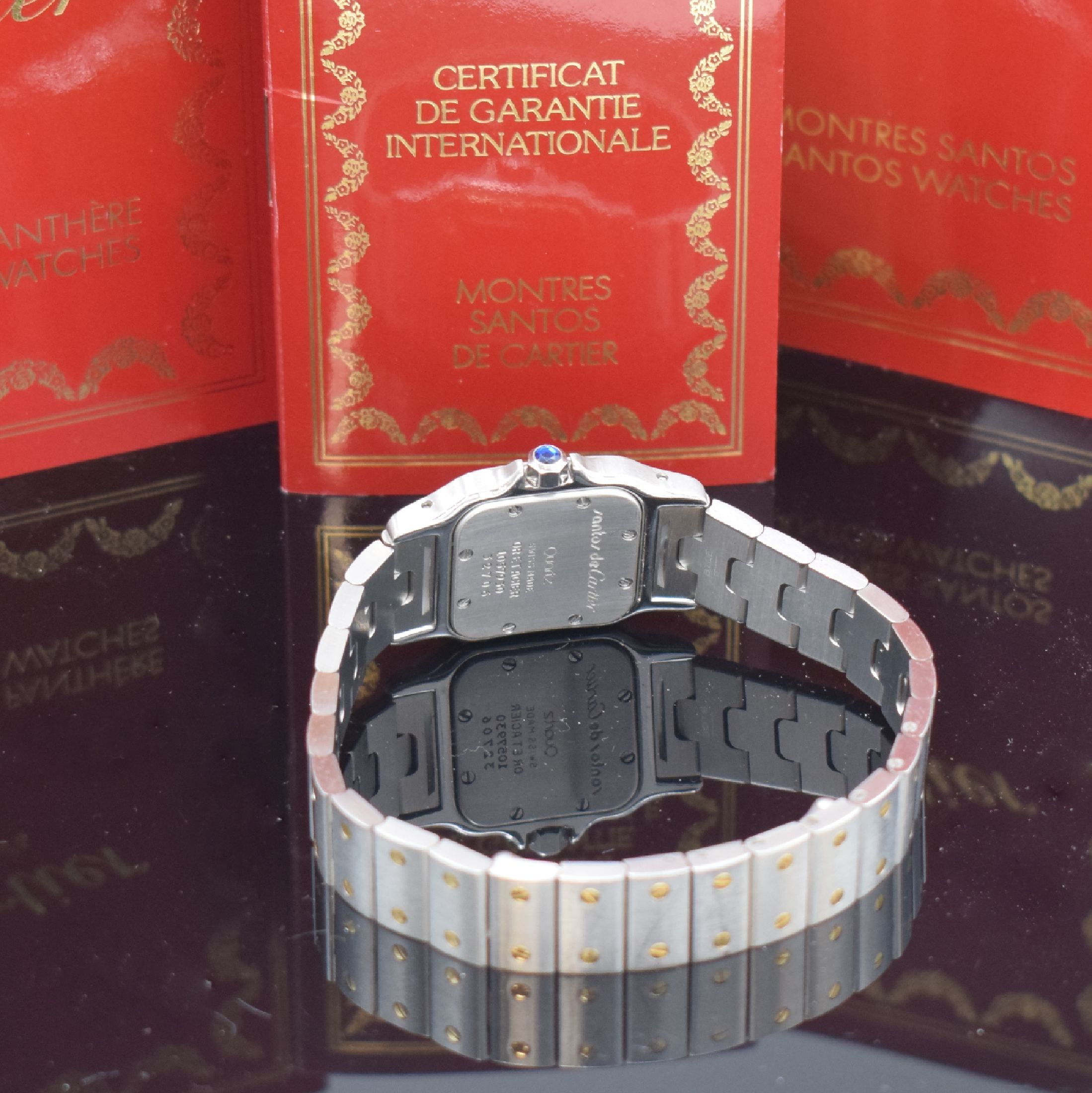 Detail e: CARTIER Santos Damenarmbanduhr in Stahl/Gold Referenz 1057930, Schweiz verk. lt. beil. Pap. 08/1993, quartz, Boden 8-fach verschr., orig. Gliederband ...
