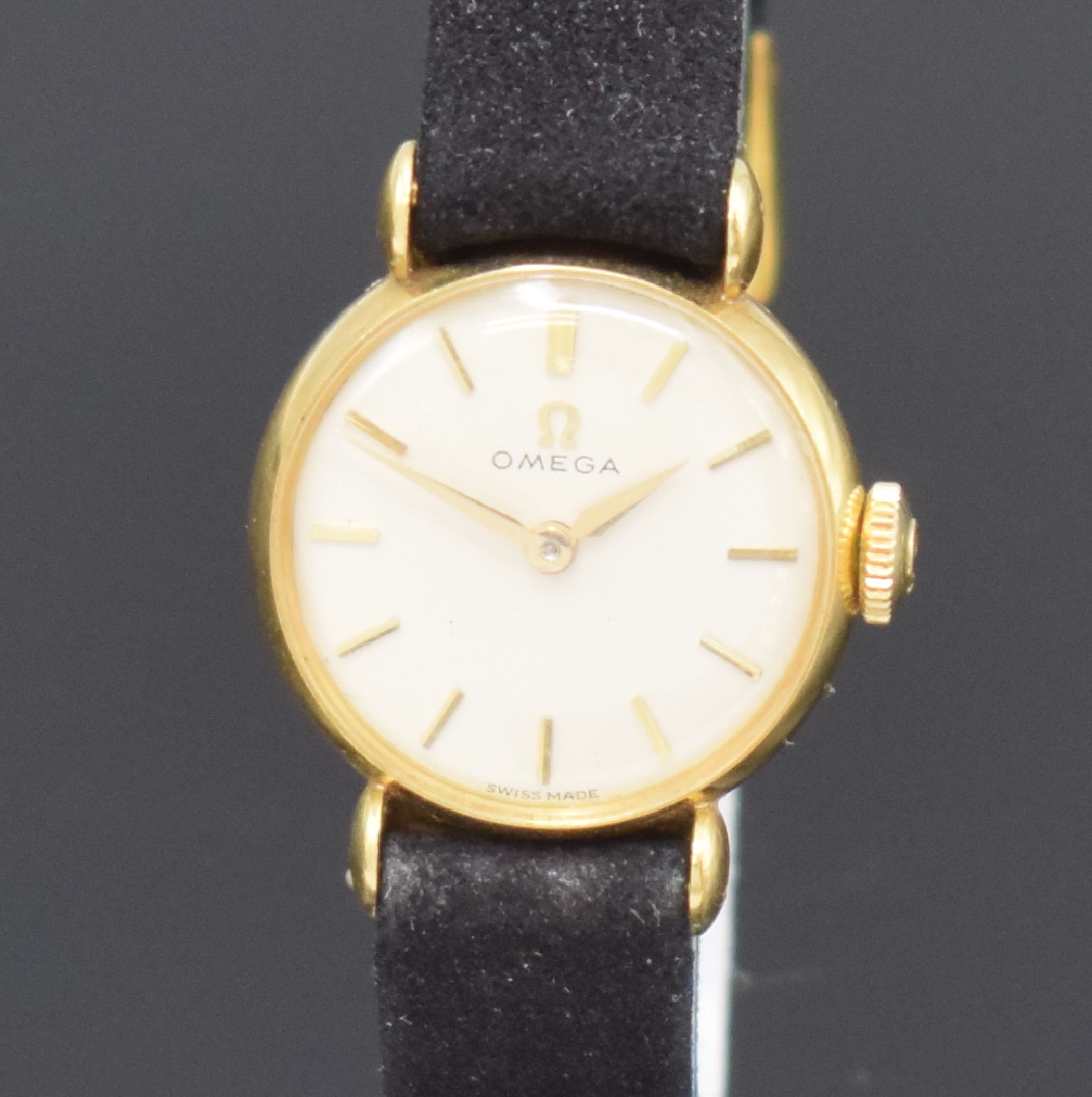 Detail a: OMEGA Damenarmbanduhr in GG 750/000, Handaufzug, Schweiz um 1962, 2-teil. Geh. inkl. orig. Lederband m. verg. orig. Dornschl., Boden aufgedr., silb. ...