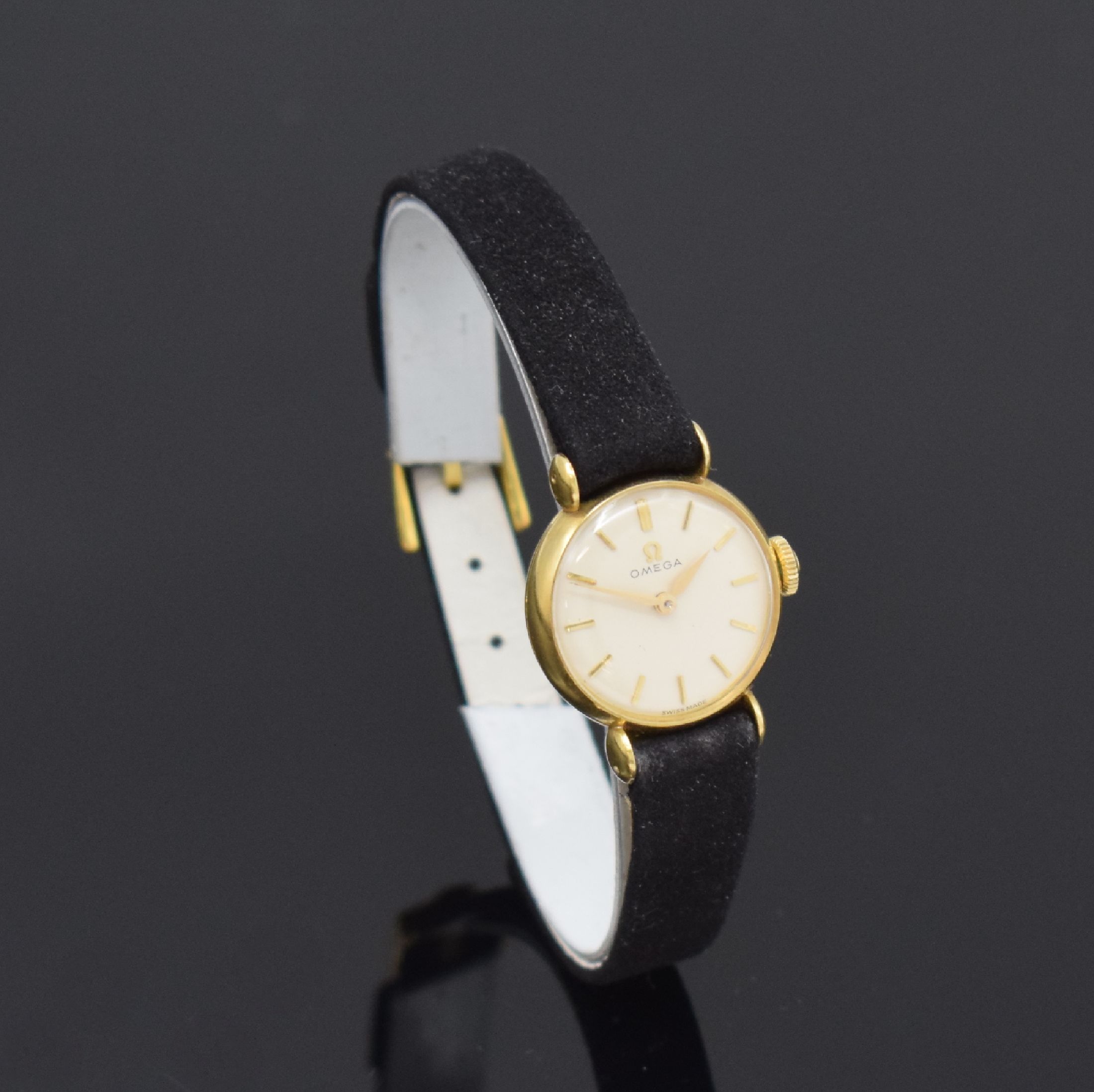 Detail b: OMEGA Damenarmbanduhr in GG 750/000, Handaufzug, Schweiz um 1962, 2-teil. Geh. inkl. orig. Lederband m. verg. orig. Dornschl., Boden aufgedr., silb. ...