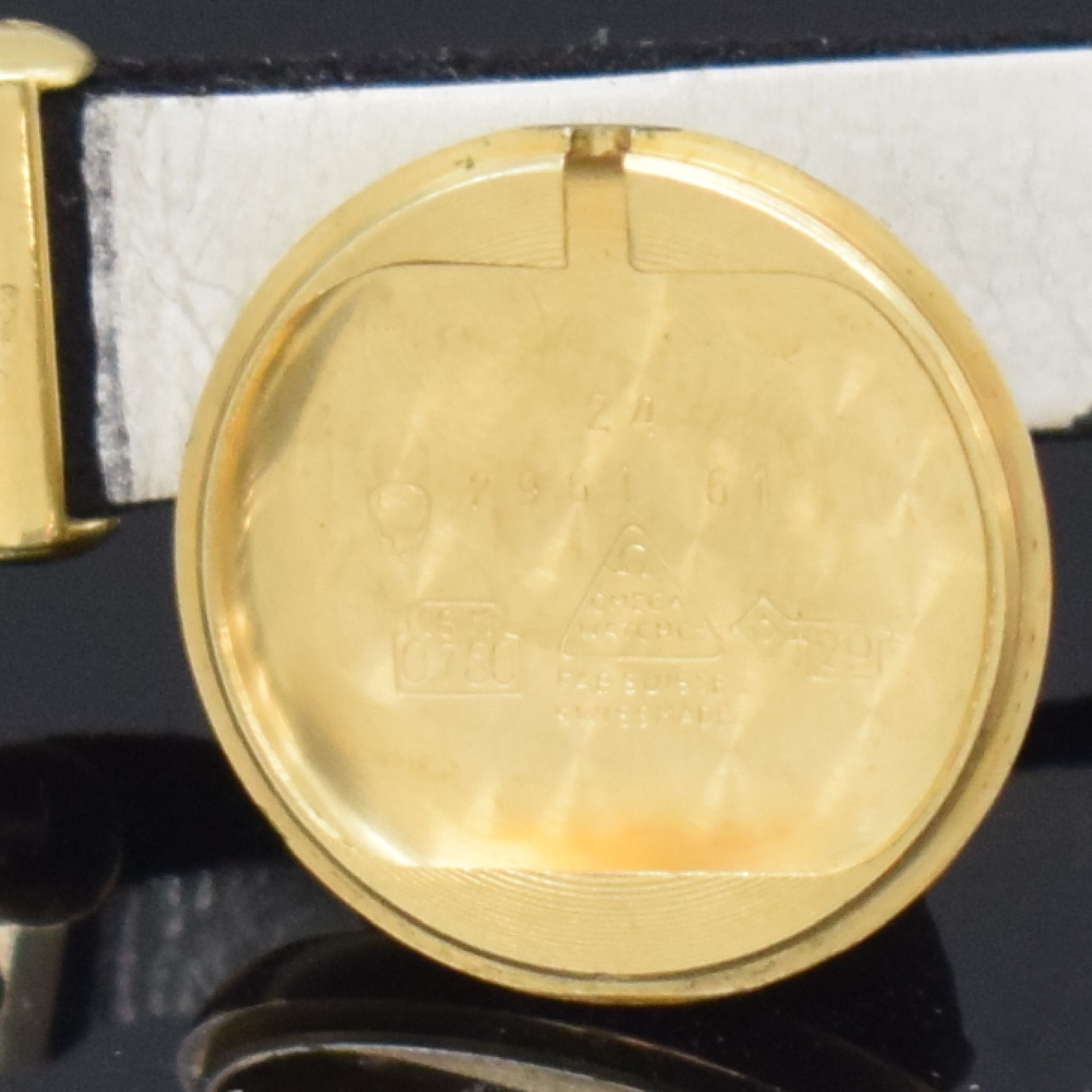 Detail f: OMEGA Damenarmbanduhr in GG 750/000, Handaufzug, Schweiz um 1962, 2-teil. Geh. inkl. orig. Lederband m. verg. orig. Dornschl., Boden aufgedr., silb. ...