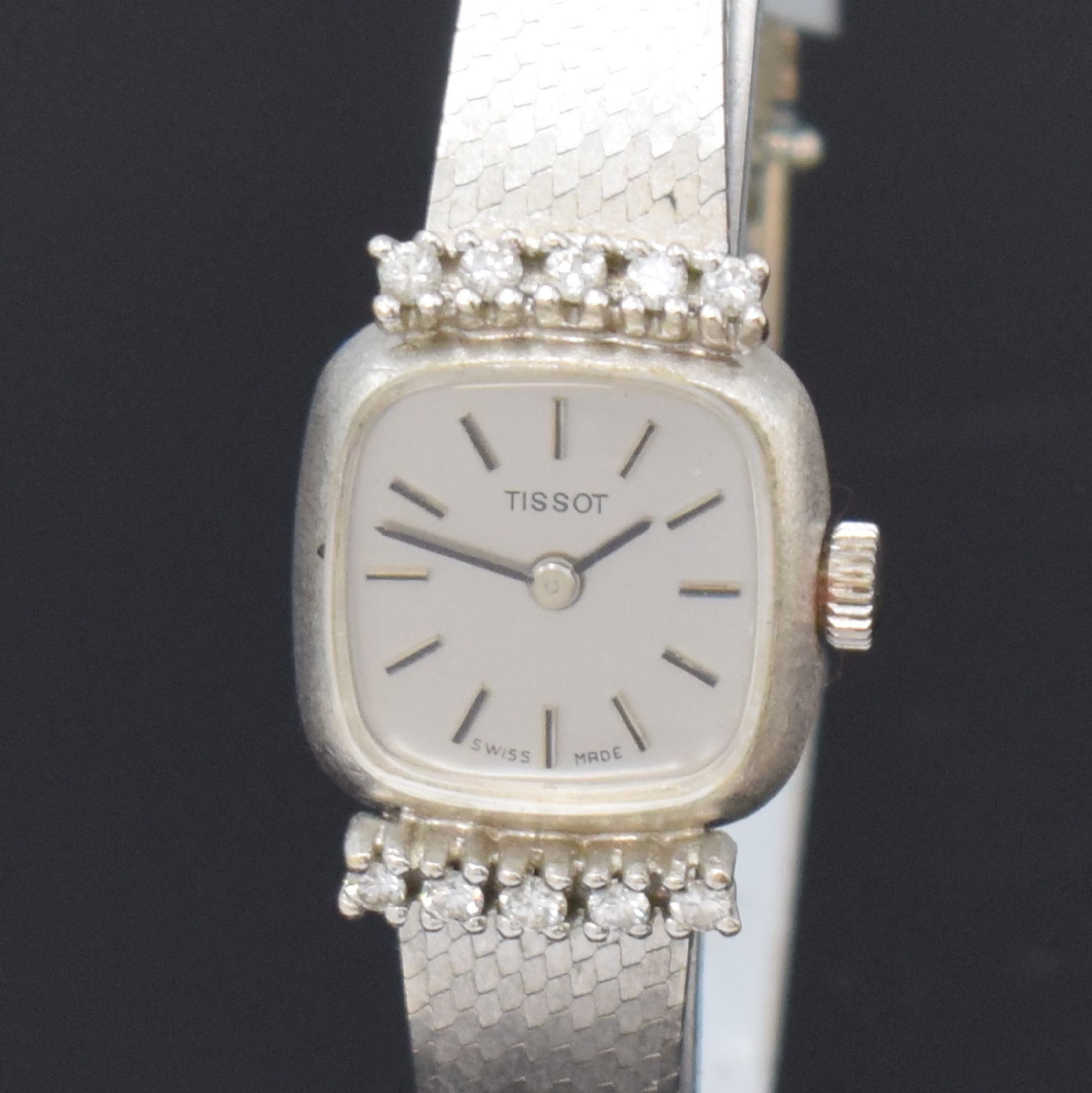Detail a: TISSOT Damenarmbanduhr in WG 585/000, Handaufzug, Schweiz um 1970, Geh. bei 6 und 12 mit 10 Diamanten bes., Boden aufgedr., vers. Zifferbl. m. ...