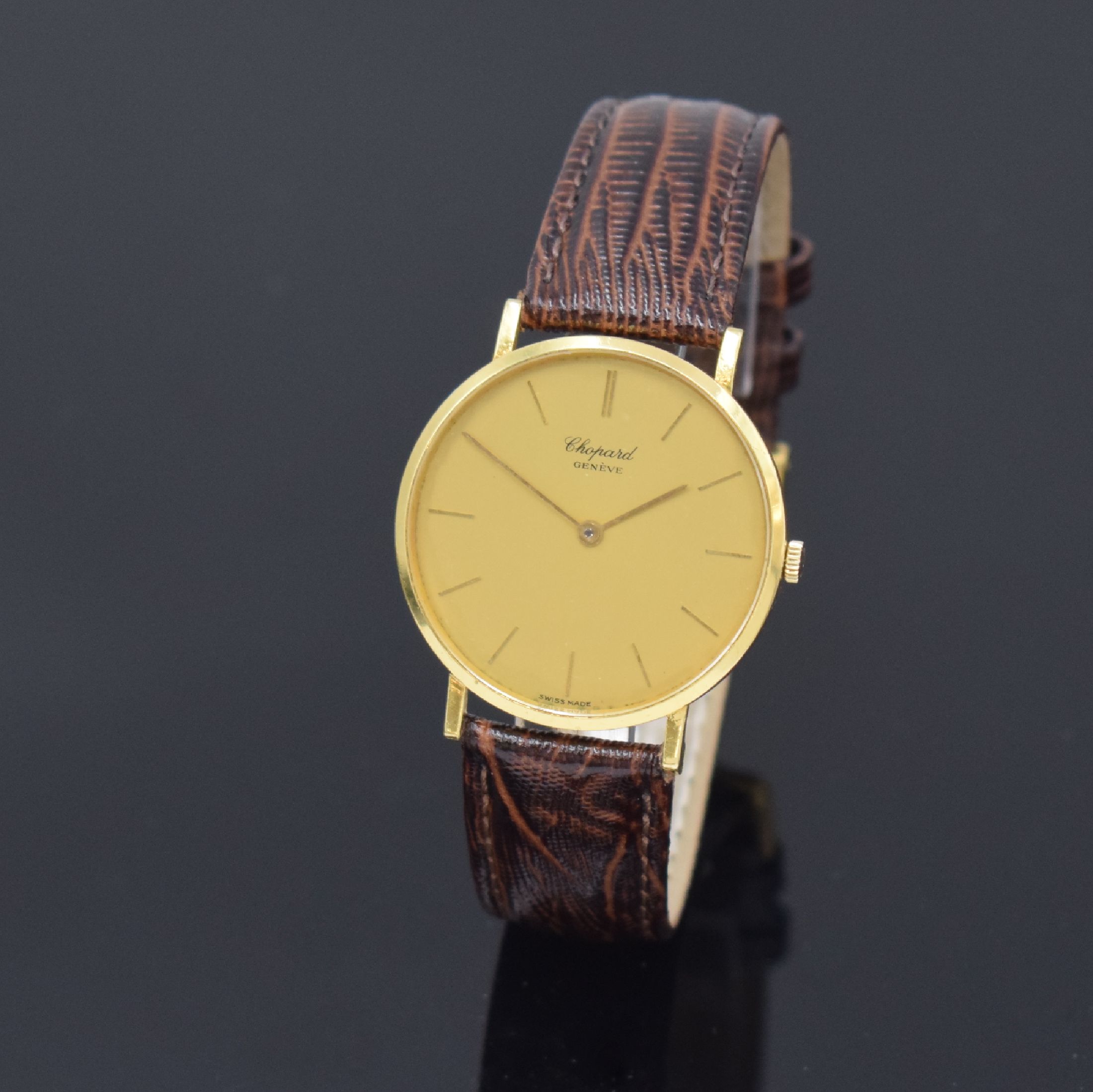 CHOPARD Armbanduhr in GG 750/000 Referenz 1013, Schweiz um 1990, Handaufzug, Boden aufgedr., gold. Zifferbl. m. aufges. gold. Std.-Indizes, gold. ...