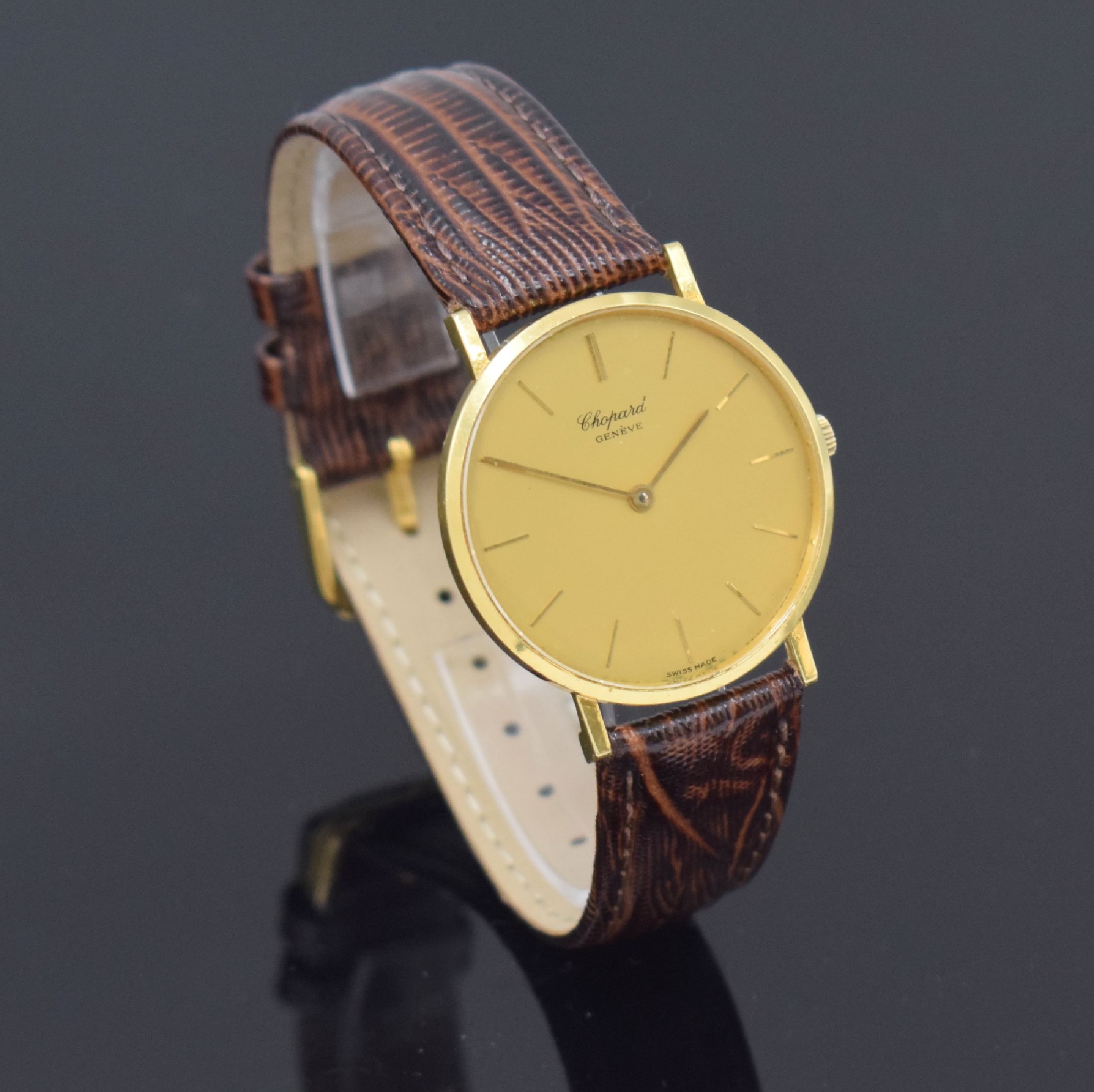 Detail b: CHOPARD Armbanduhr in GG 750/000 Referenz 1013, Schweiz um 1990, Handaufzug, Boden aufgedr., gold. Zifferbl. m. aufges. gold. Std.-Indizes, gold. ...