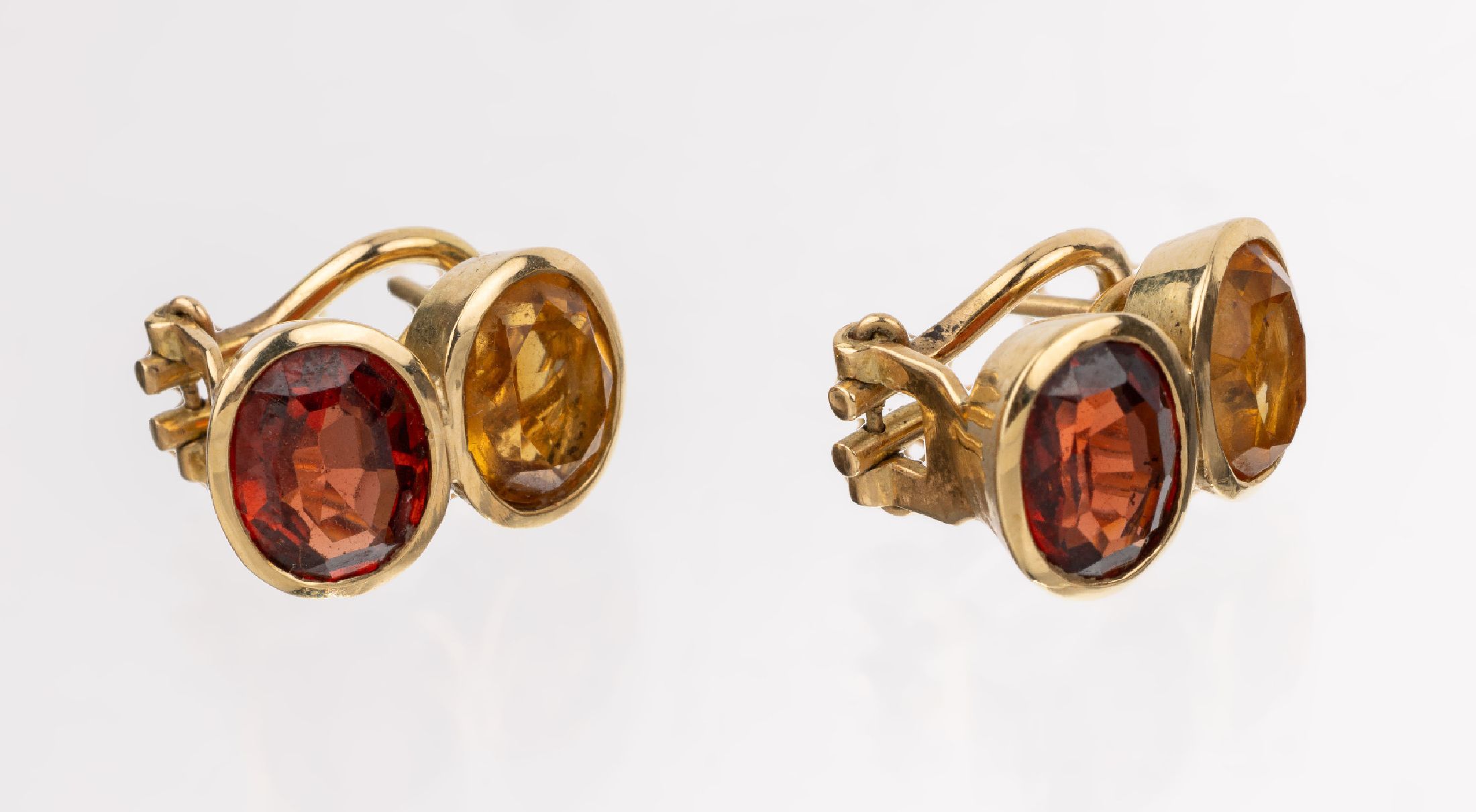 Paar 14 kt Gold Citrin-Ohrstecker, GG 585/000 gepr., 4 ovalfacett. Citrine in versch. Farbnuancen, Clipbrisuren, ca. 9.2 g