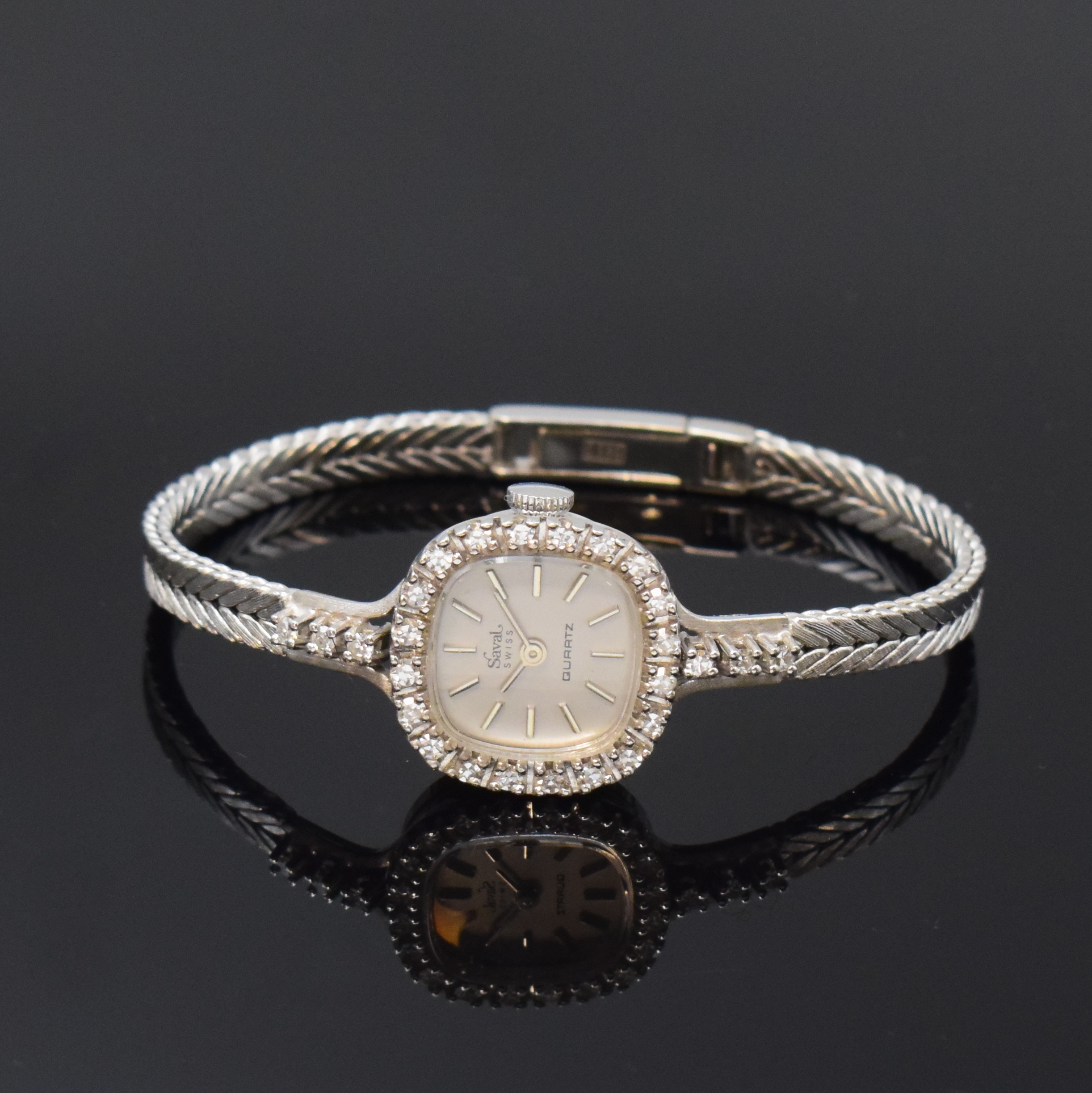 SAVAL Damenarmbanduhr in WG 585/000 mit Diamanten, quarz, Schweiz um 1975, Boden aufgedr., silb. Zifferbl. m. aufgel. Indizes, Anz. v. Std. und Min., ...