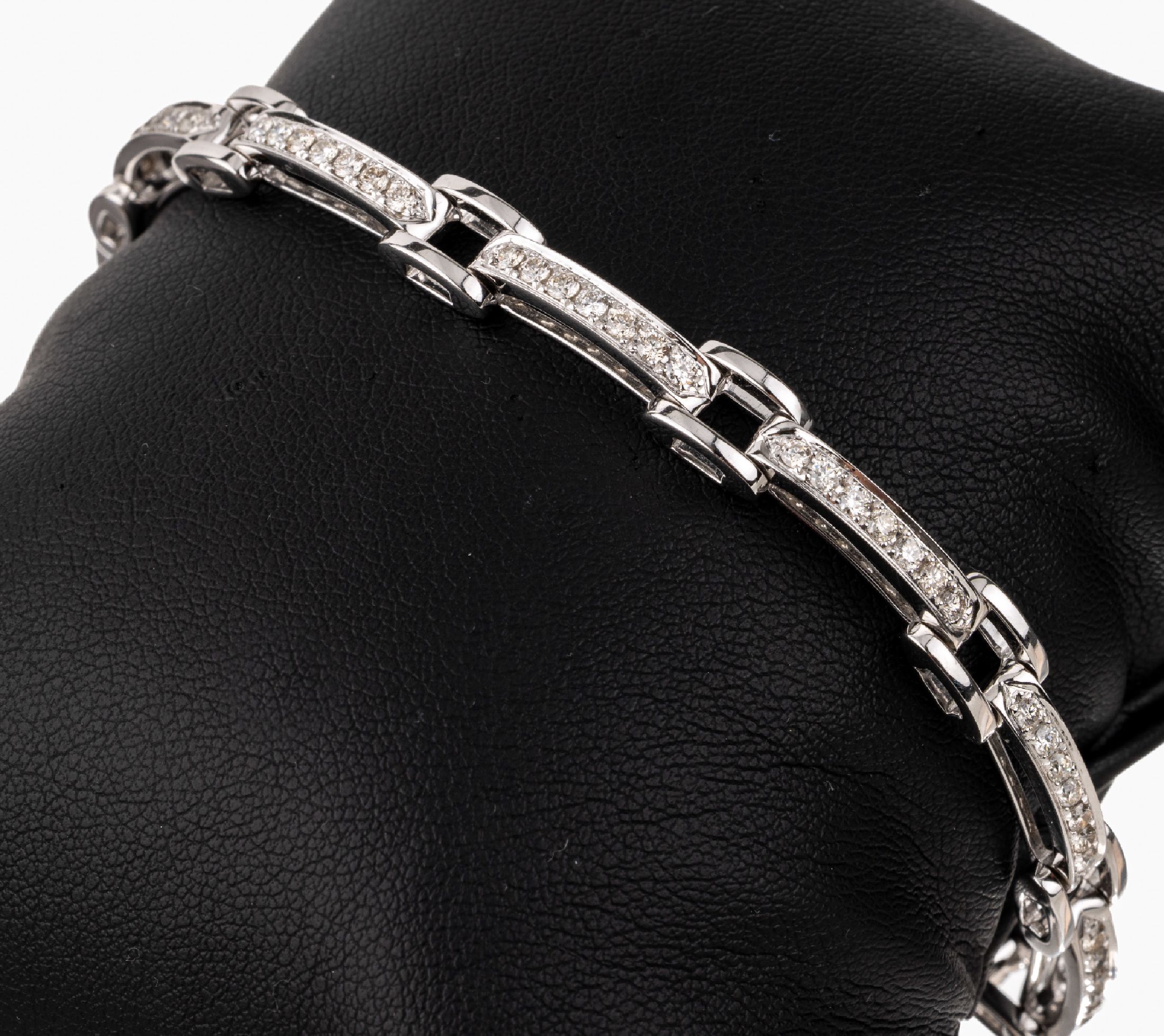 18 kt Gold Brillant-Armband, WG 750/000, 63Brillanten zus. ca. 1.64 ct Weiß/si, L. ca. 17.5 cm, Klappverschluss, ca. 20.6 g