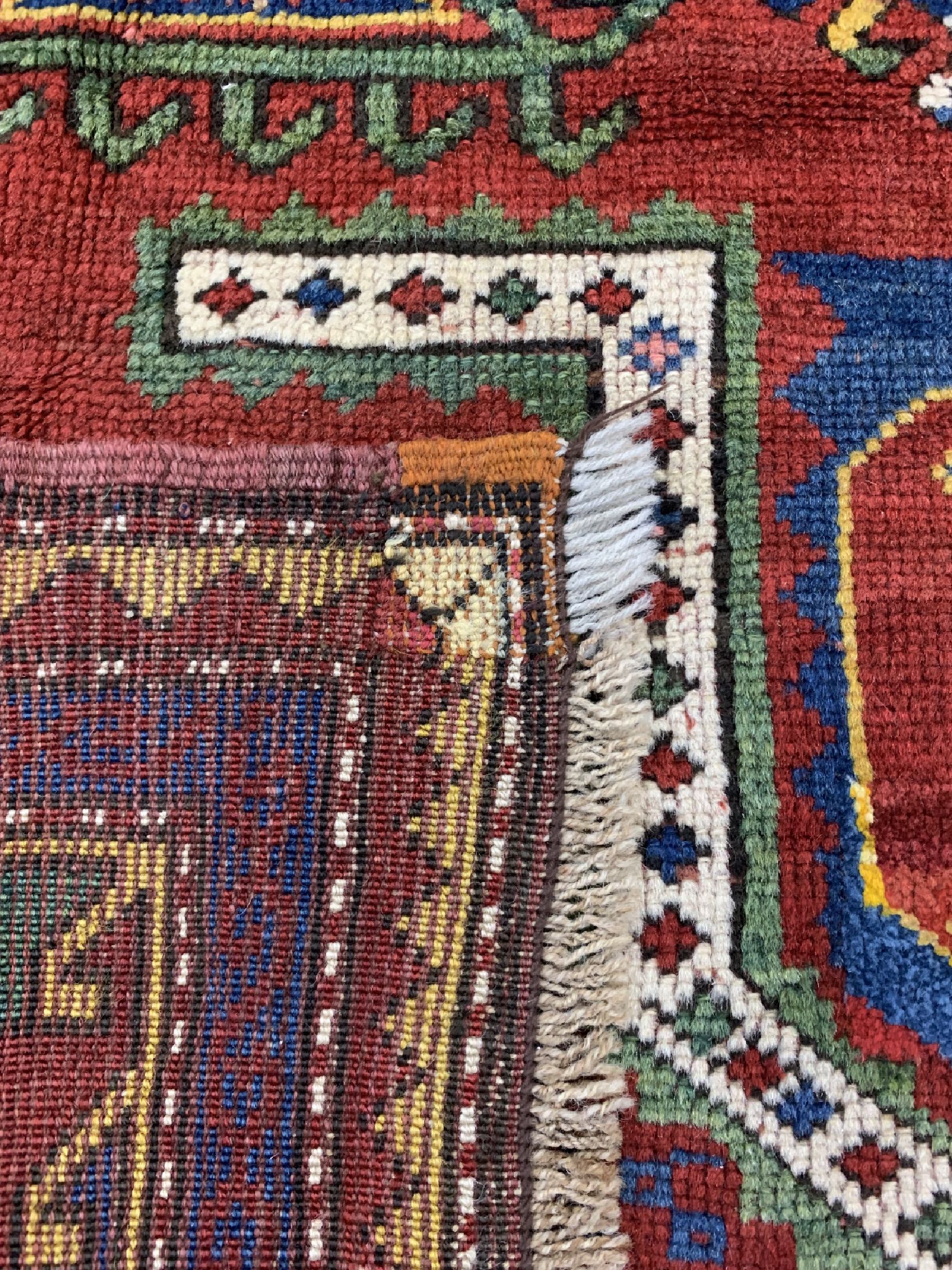 Detail e: Antiker Fachalo, Kaukasus, um 1900, Wolle auf Wolle, ca. 202 x 123 cm, EHZ: 2, restauriert