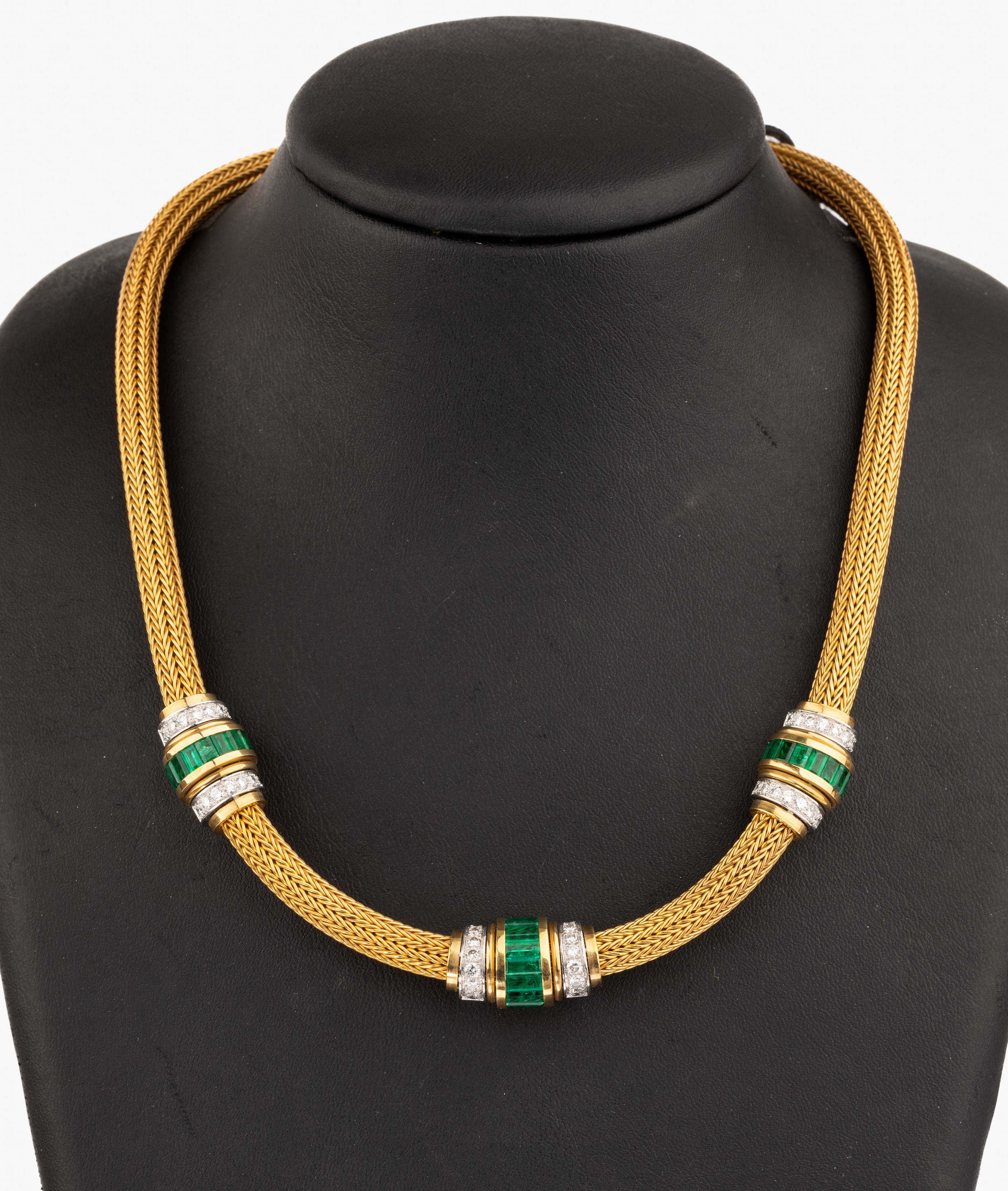Ausgefallenes 18 kt Gold Smaragd-Brillant- Collier, GG/WG 750/000, gepr., Smaragd- Baguettes von intensiver Farbe zus. ca. 5.37 ct, Brillanten in WG ...