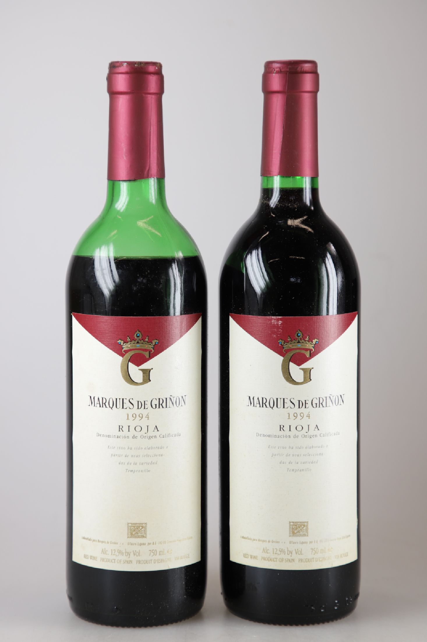 12 Flaschen 1994 Marques de Grinon, Rioja, Calificada, je ca. 75cl, 12,5% Vol., in geöffneter orig. Kiste, 1 Flasche undicht