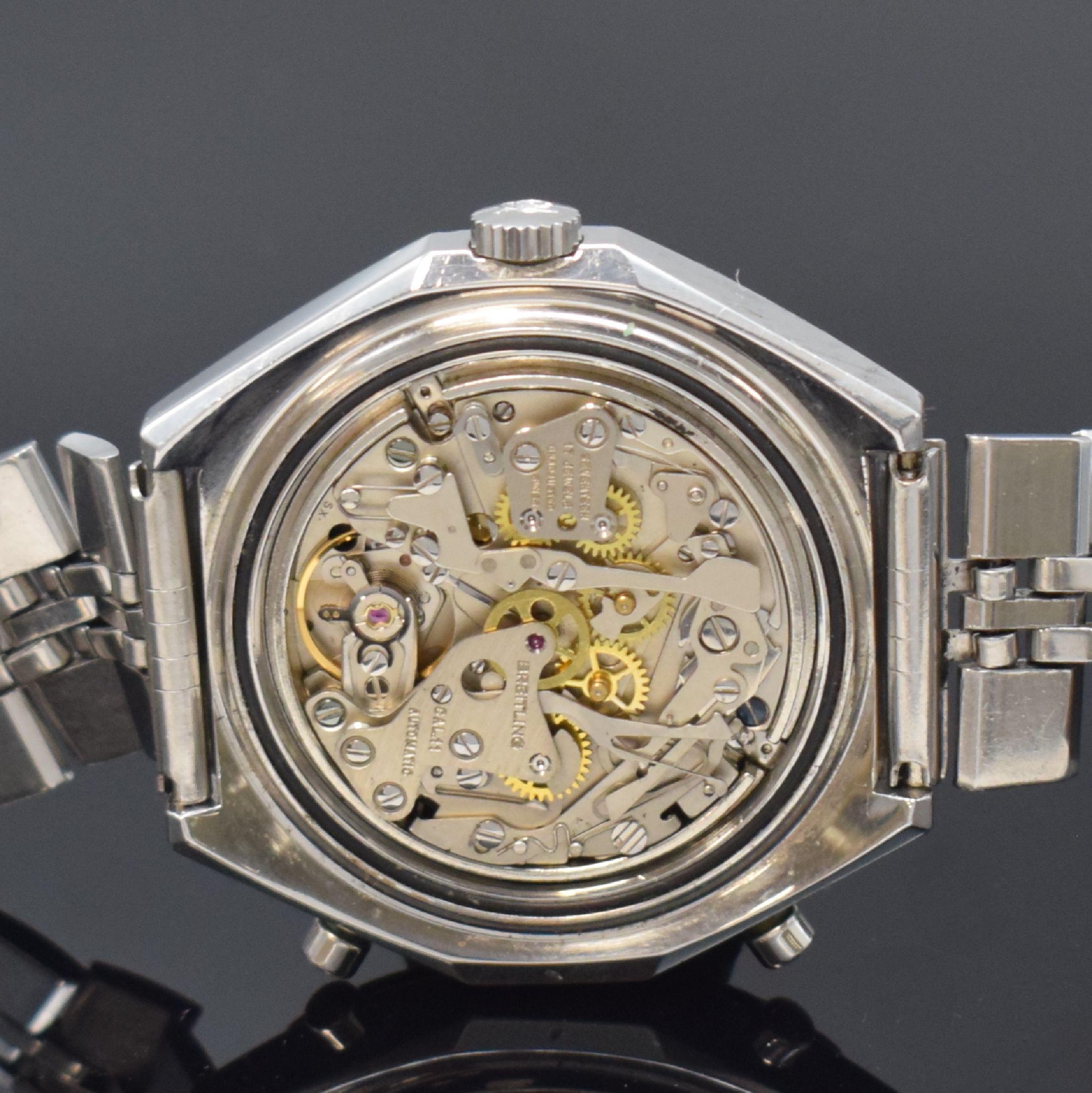Detail e: BREITLING Armbandchronograph Navitimer Chrono-Matic Referenz 1806, Automatik, Schweiz um 1970, verschr. Stahlgeh. inkl. orig. Stahlband m. Faltschl., ...