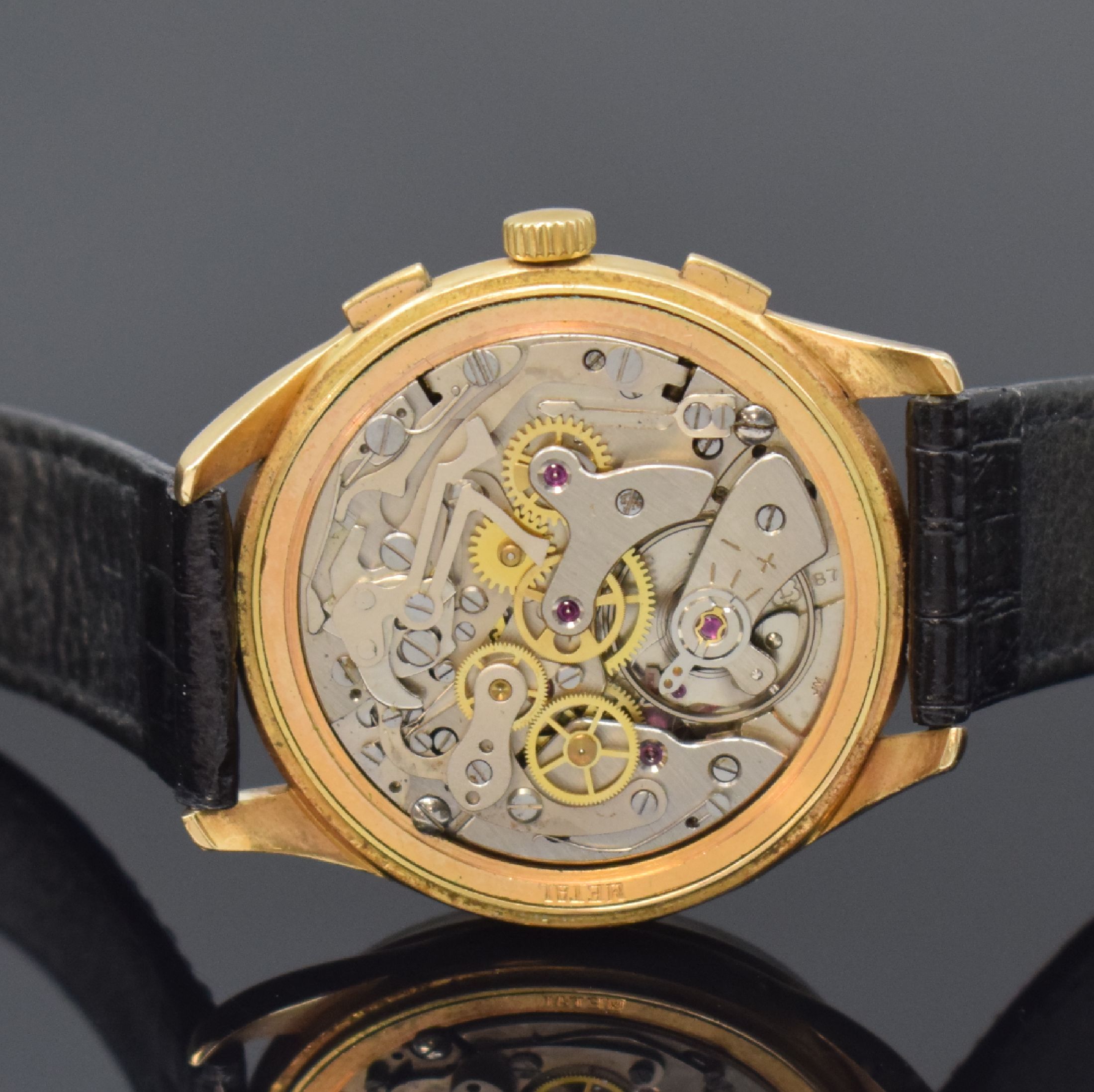 Detail e: ROXY Herrenchronograph in RG 750/000 mit Datum, Schweiz um 1960, Handaufzug, Boden u. Glasrand aufgedr., silb. Zifferbl. pat./fl., gold. Std.-Ind., ...