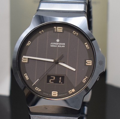 26733502a - JUNGHANS Force Mega Solar in ceramic reference 018/1132, quartz, case back screwed-down 4-times, original ceramic bracelet with butterfly buckle, correction at the sides in case at 3 inserted, black dial with integrated antenna, Arabic numerals, digital date at 6, diameter approx. 42 mm, length approx. 20 cm, box, papers and 2 additional bracelet elements enclosed, condition 2