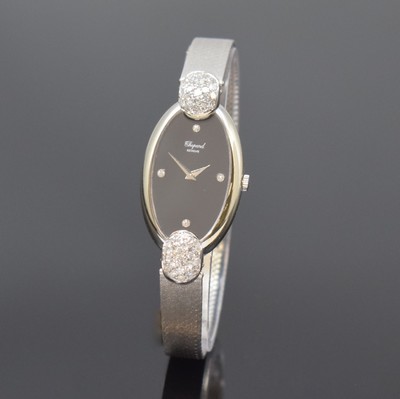 Image 26733614 - CHOPARD ladies wristwatch in white gold 18k with diamonds, manual winding, case with gold bracelet 18k, lugs set with diamonds, case back screwed-down 4-times, onyx-dial with 4 diamond-indices, silvered hands, diameter approx. 21,5 mm, length approx. 18,5 cm, Chopard box enclosed, bracelet with solved rhodination, condition 2