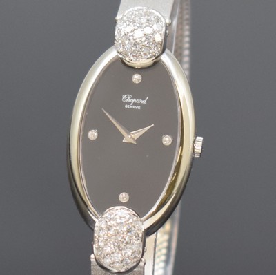 26733614a - CHOPARD ladies wristwatch in white gold 18k with diamonds, manual winding, case with gold bracelet 18k, lugs set with diamonds, case back screwed-down 4-times, onyx-dial with 4 diamond-indices, silvered hands, diameter approx. 21,5 mm, length approx. 18,5 cm, Chopard box enclosed, bracelet with solved rhodination, condition 2