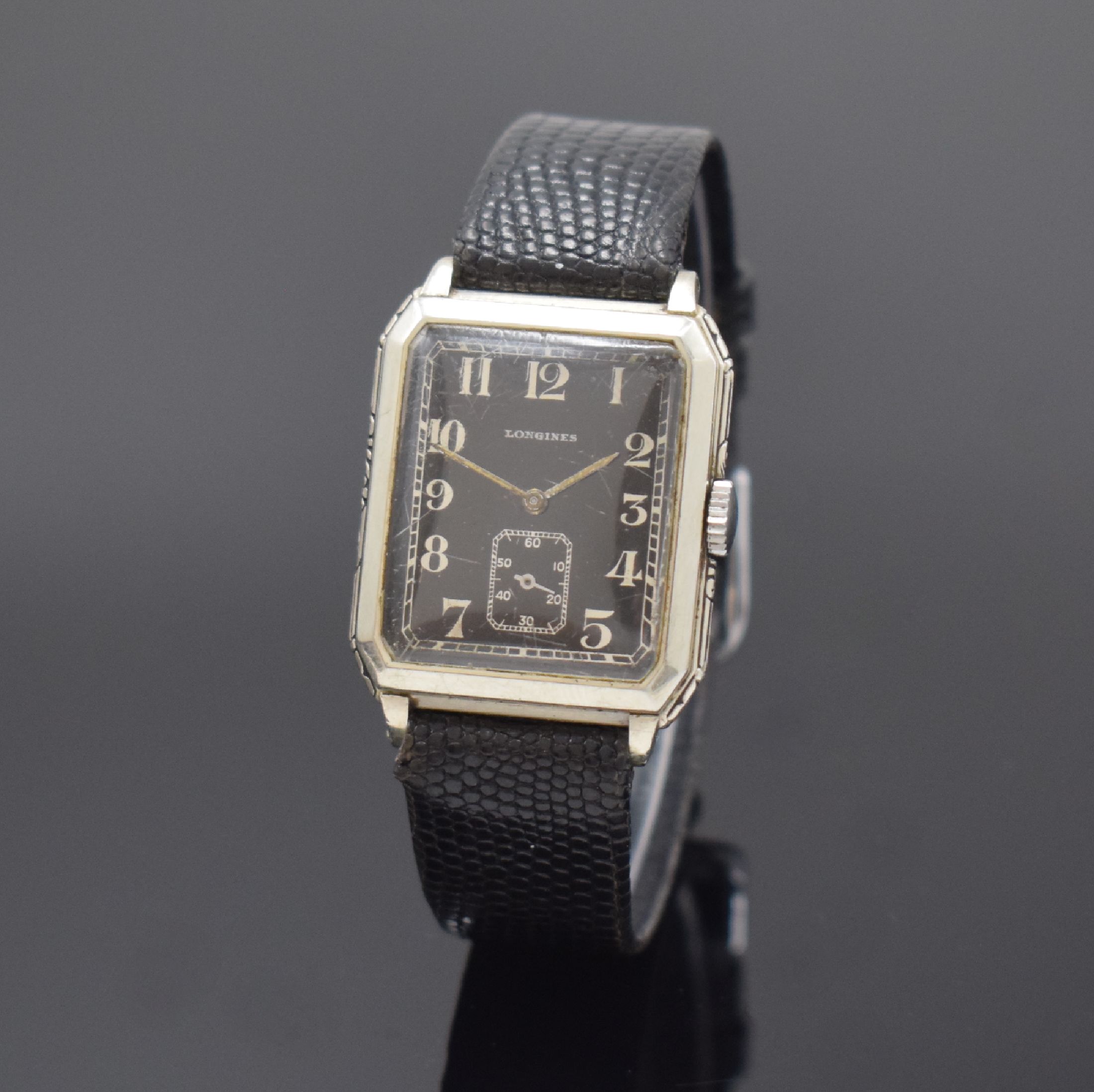 LONGINES vergoldete Armbanduhr, Schweiz/USA um 1929, Handaufzug, Geh. teils grav., Boden aufgedr., schwarzes Zifferbl. m. arab. Zahlen, silb. Zeiger, ...