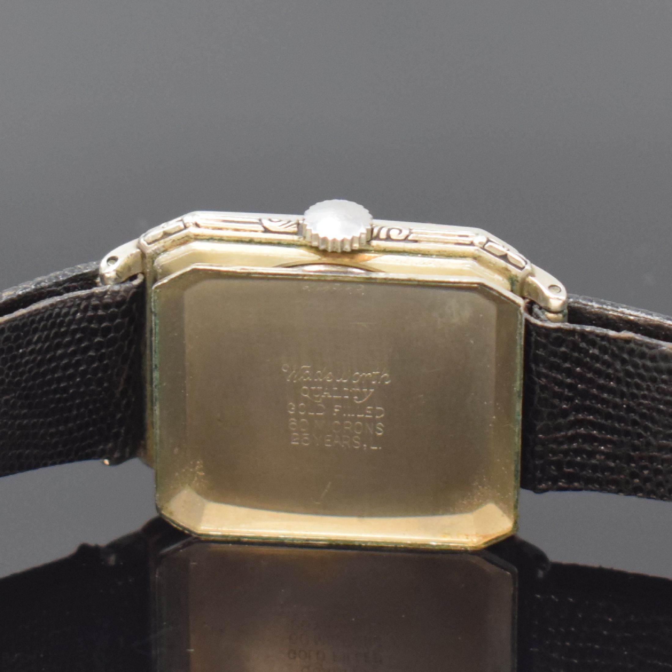 Detail f: LONGINES vergoldete Armbanduhr, Schweiz/USA um 1929, Handaufzug, Geh. teils grav., Boden aufgedr., schwarzes Zifferbl. m. arab. Zahlen, silb. Zeiger, ...