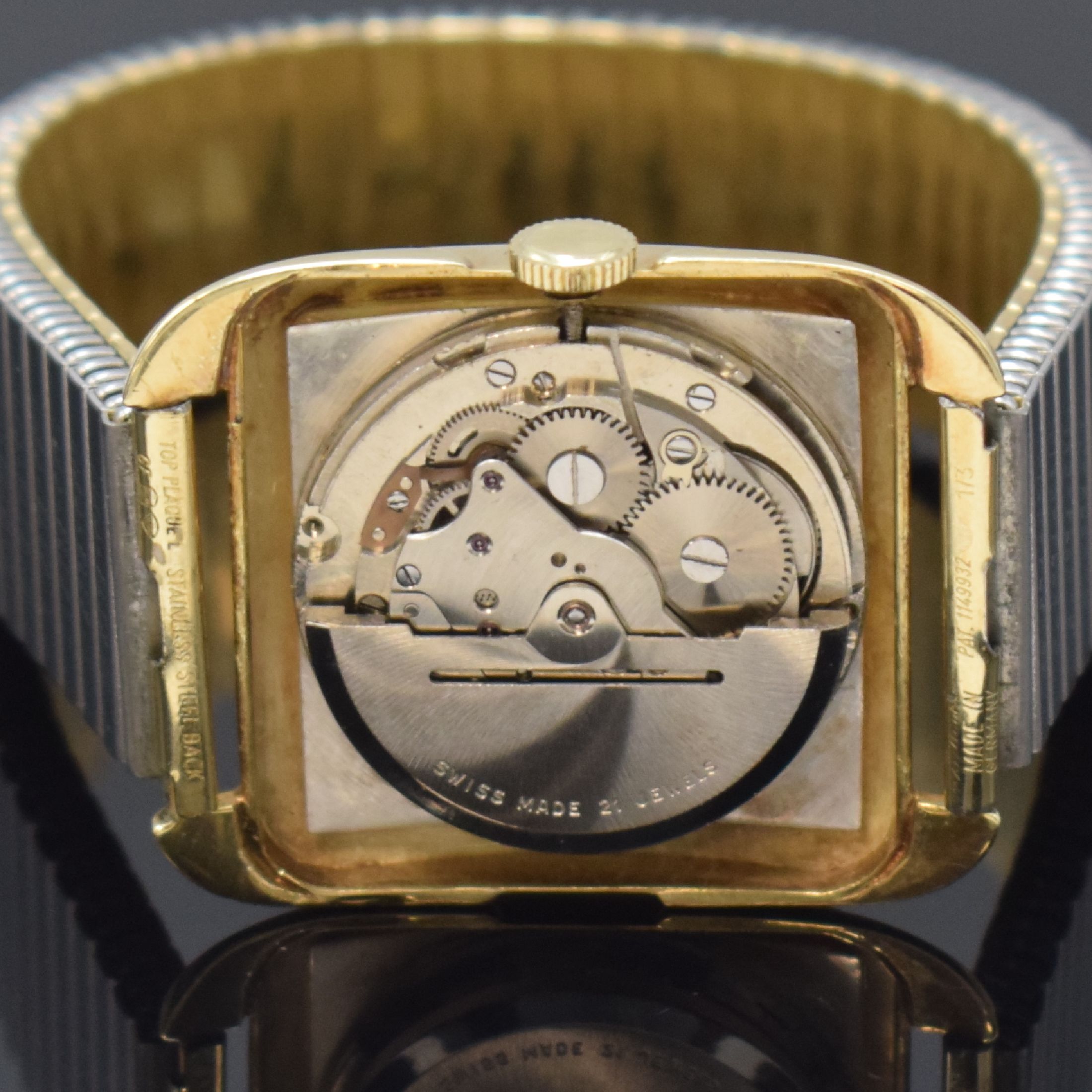Detail d: RENZ Armbanduhr in GG 585/000, Schweiz um 1950, Automatik, Boden aufgedr., neutr. verg. Flexband, silb. Zifferbl. m. gold. Std.-Ind., gold. Zeiger, ...