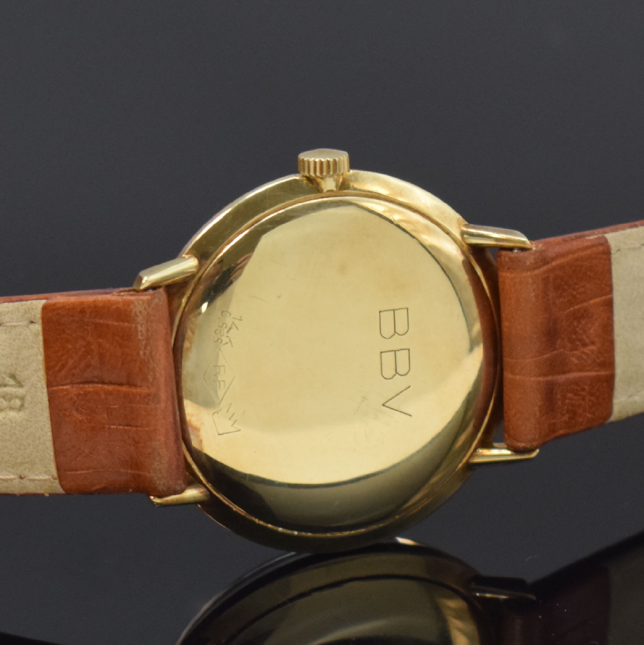 Detail c: EXQUISIT Armbanduhr in GG 585/000, Schweiz um 1960, Handaufzug, Boden m. Grav. gedr., silb. Zifferbl. m. gold. Std.-Ind., gold Leuchtzeiger, Kal. ETA ...