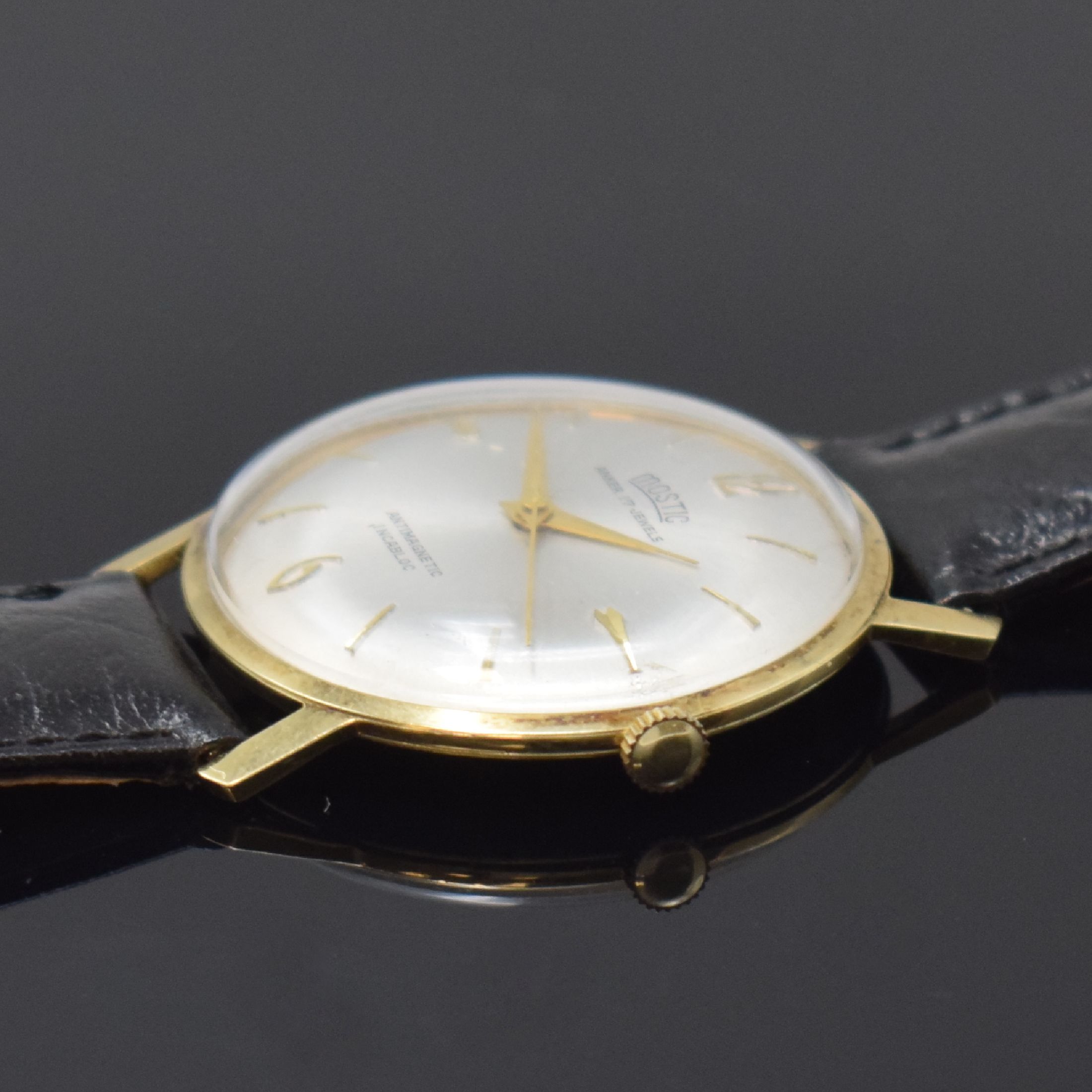 Detail b: MOSTIC Armbanduhr in GG 585/000, Schweiz um 1965, Handaufzug, gedr. Boden in Metall/GG 585/000, silb. Zifferbl. m. gold. Std.-Ind., gold. Zeiger, ...
